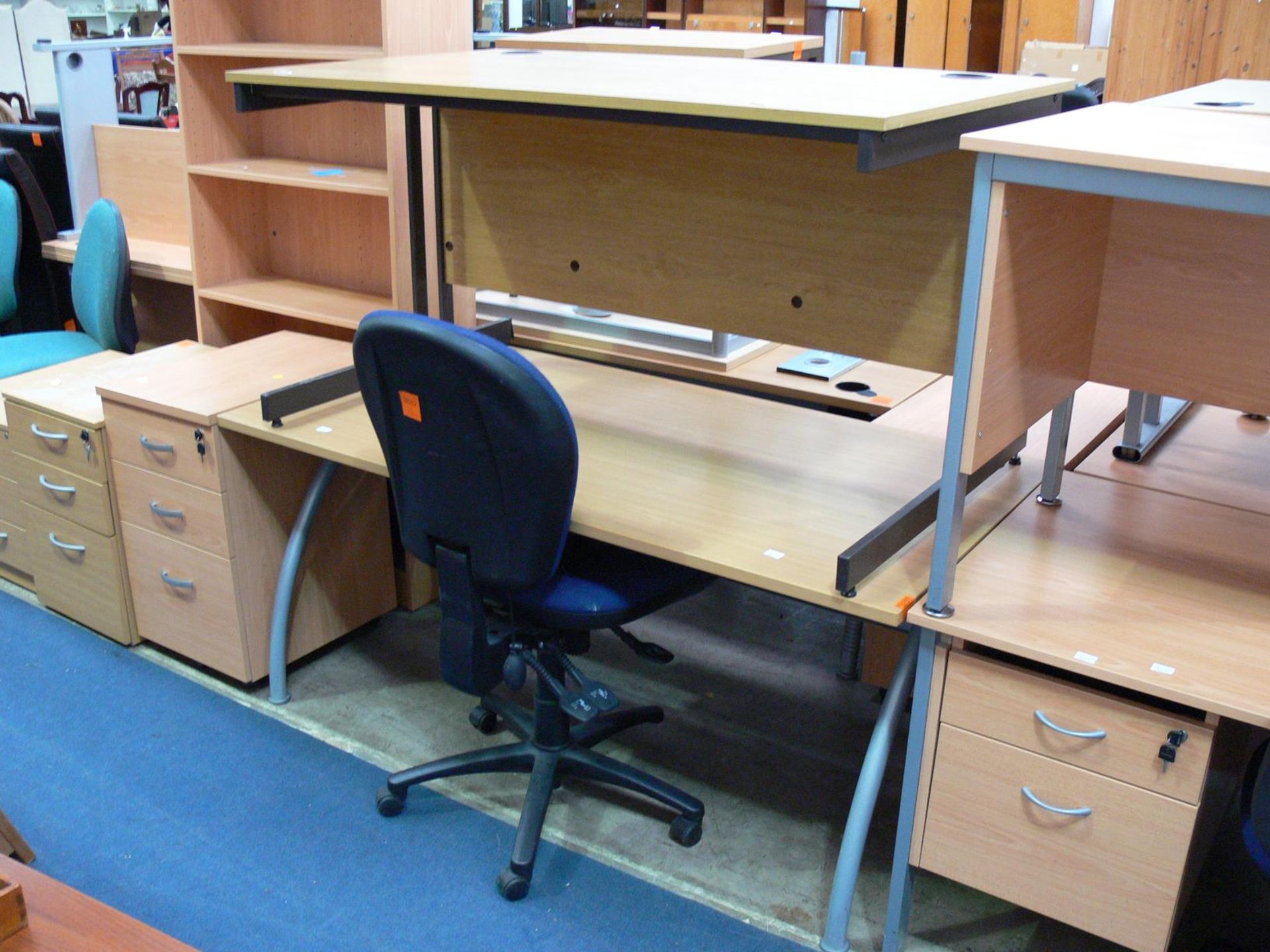 *2 x Rectangular non-matching office desks and 1 x Operators chair.