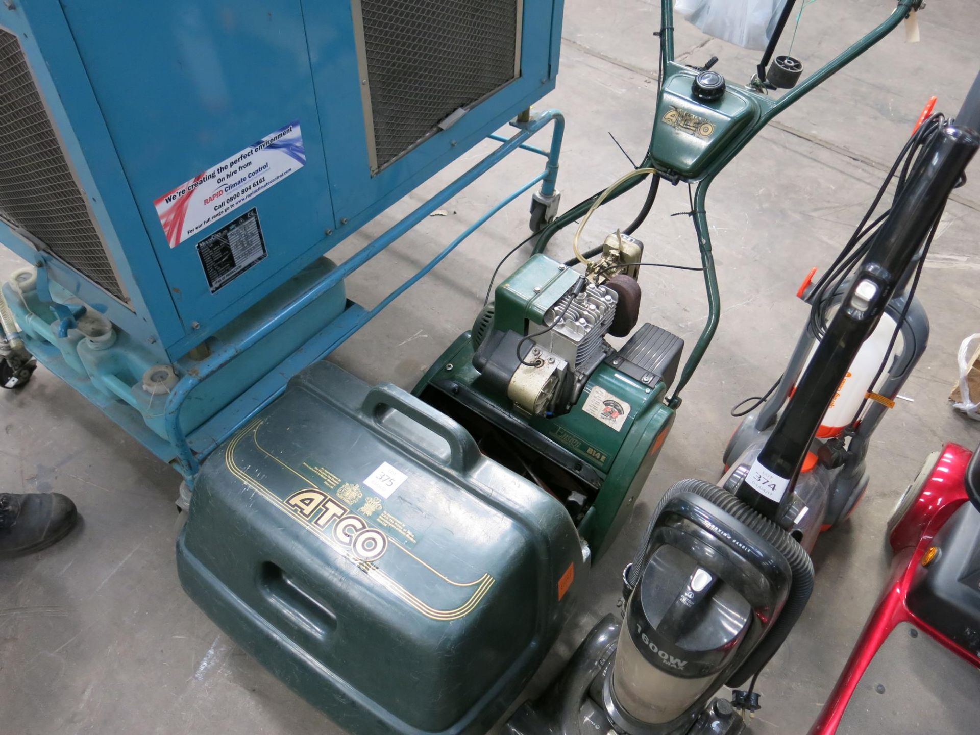 An ATCO Ensign B14E petrol cylinder mower.