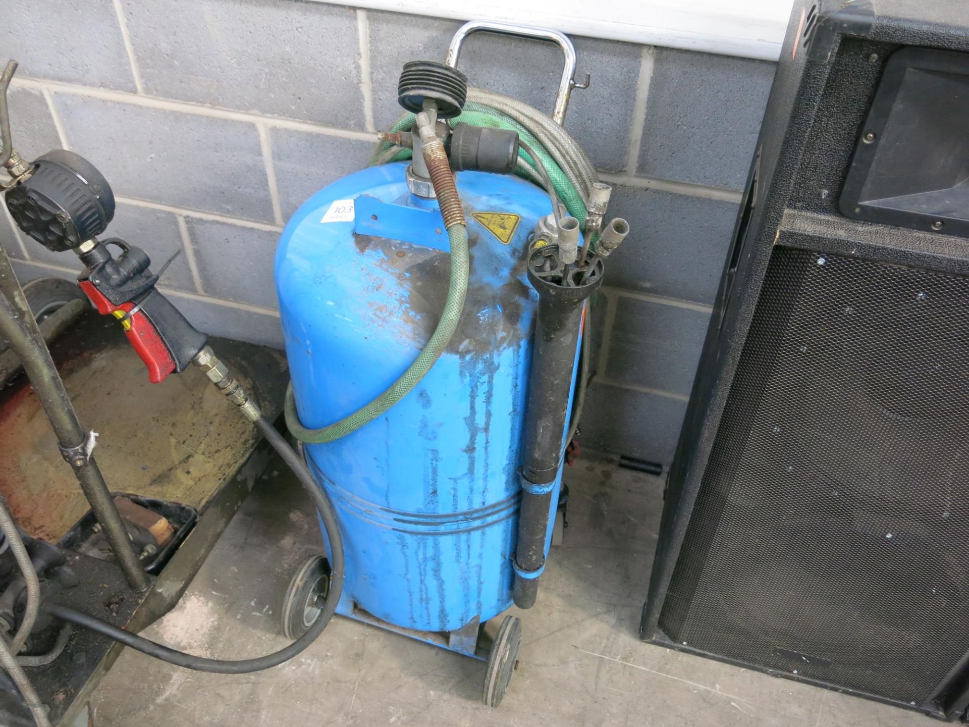 * An Alfa Portable/Mobile Oil Changer Unit