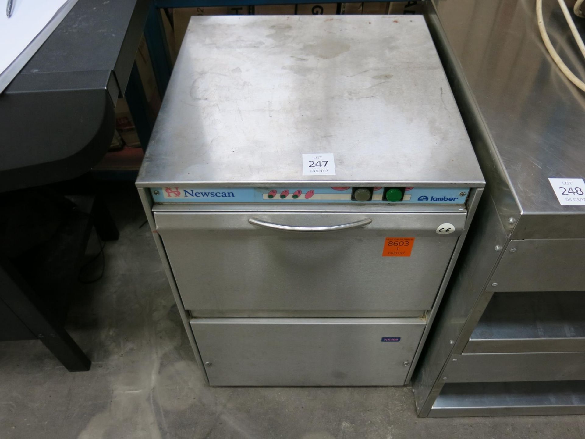 * A stainless steel Newscan Lamber glass washer