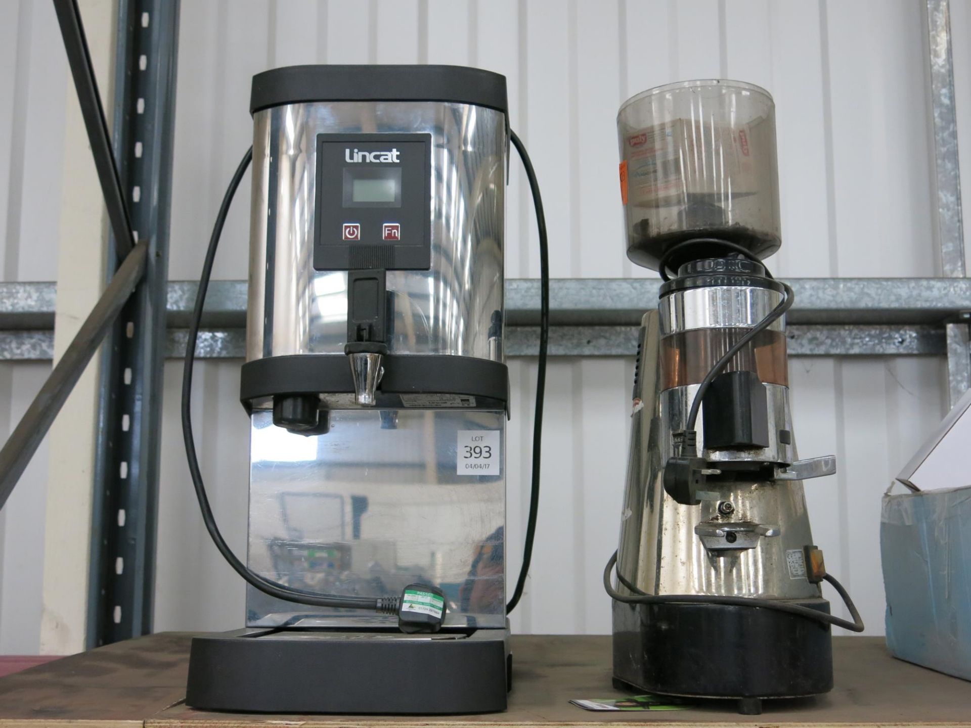 * A Stainless Steel Hot Water Dispenser together with a Stainless Steel Coffee Machine