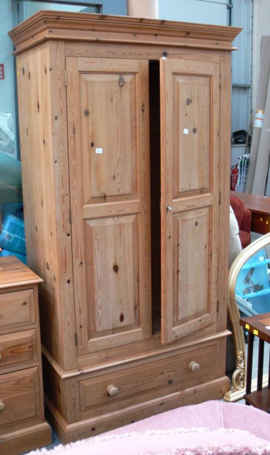 A Pine two door Wardrobe with clothes rail above single drawer (H 198cm, W 102cm, D 55cm) together - Image 3 of 3