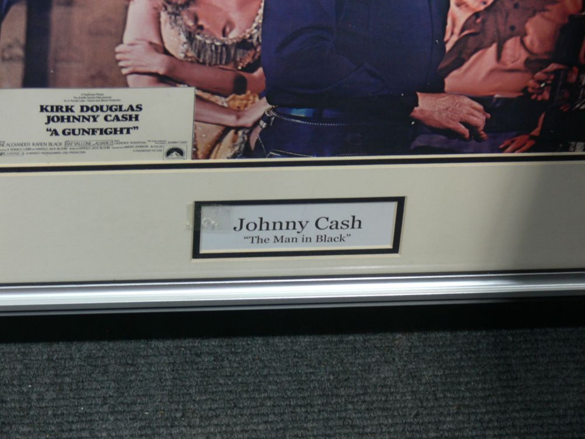 A signed Johnny Cash Poster in a frame (frame 49cm x 79cm) together with five pictures of Adam Faith - Image 6 of 7