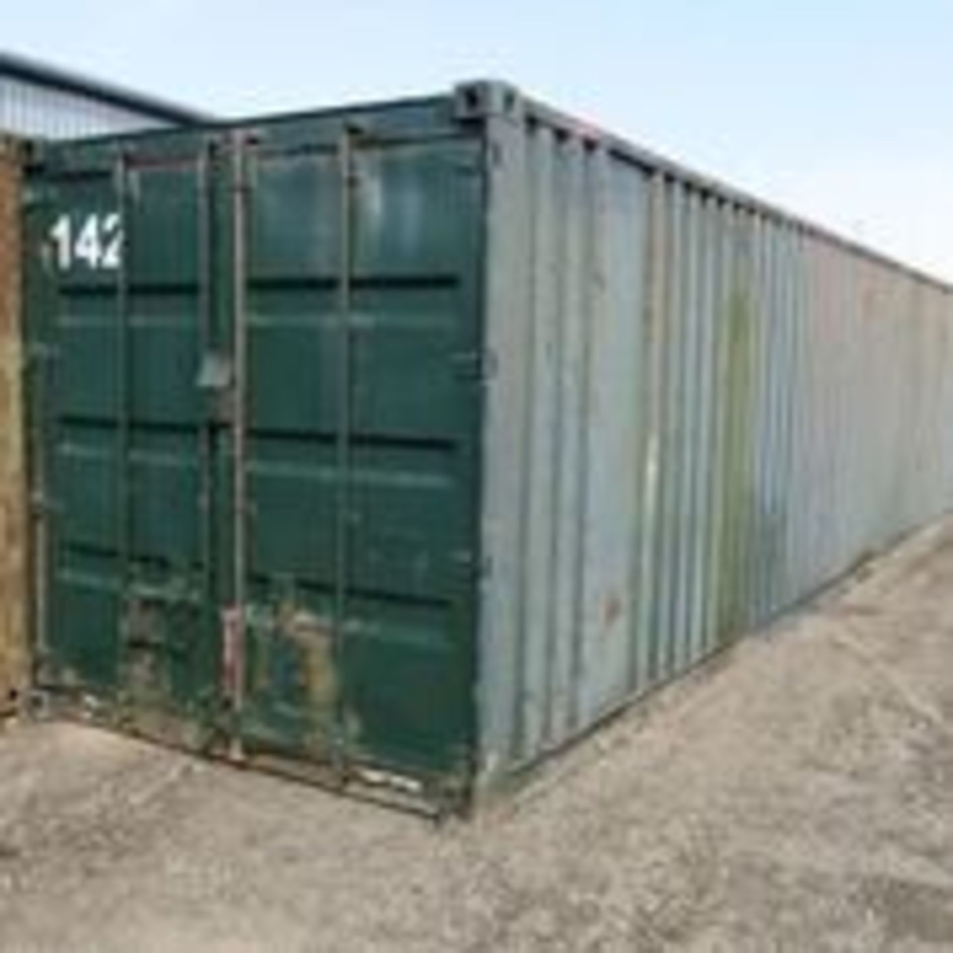 * 40ft shipping container (ID 142) with insulated roof. Sold loaded free onto buyers transport. - Image 2 of 6