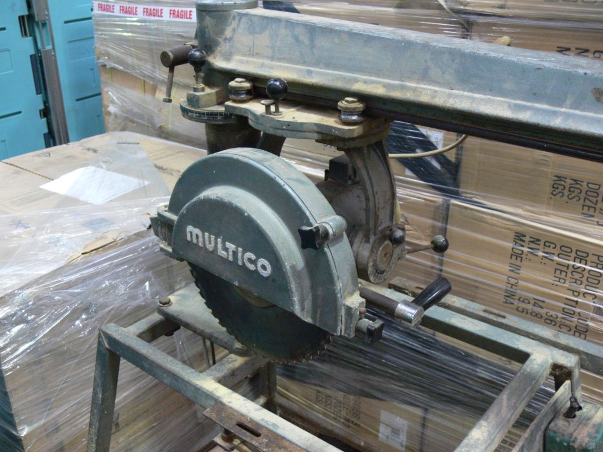 * A Multico 14" Cross Cut Saw. Please note there is a £10 + VAT Lift Out Fee on this lot