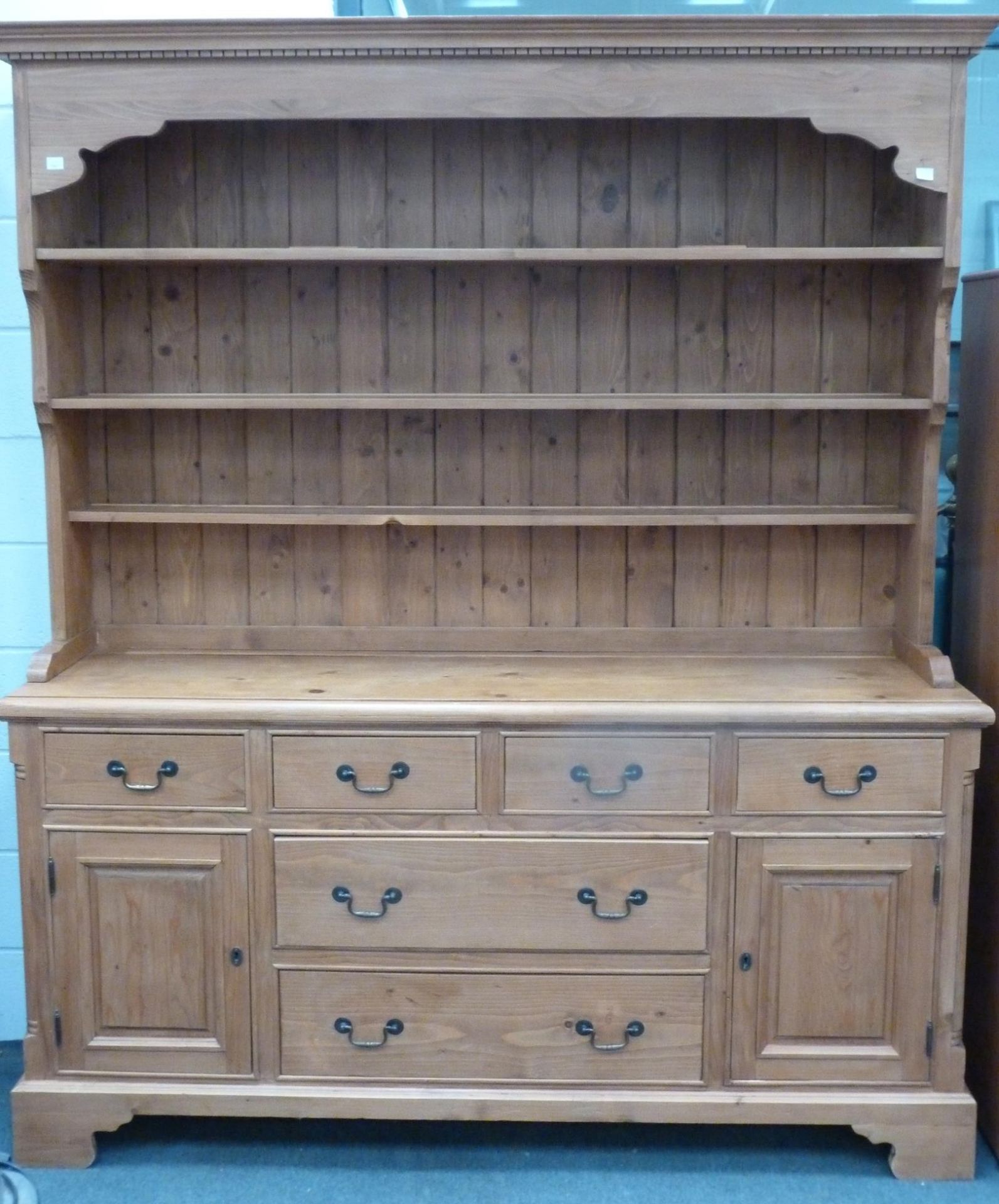 A large three shelf Welsh Dresser with two doors & six drawers (H 212cm x W 86cm x D 50cm) (est. £