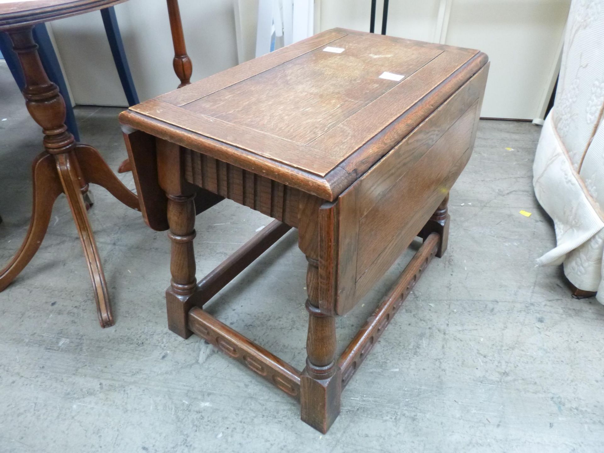 A small Oak Drop Leaf Table (H41cm, W Open 66cm, W Closed 31cm, D50cm together with an oval Flip Top