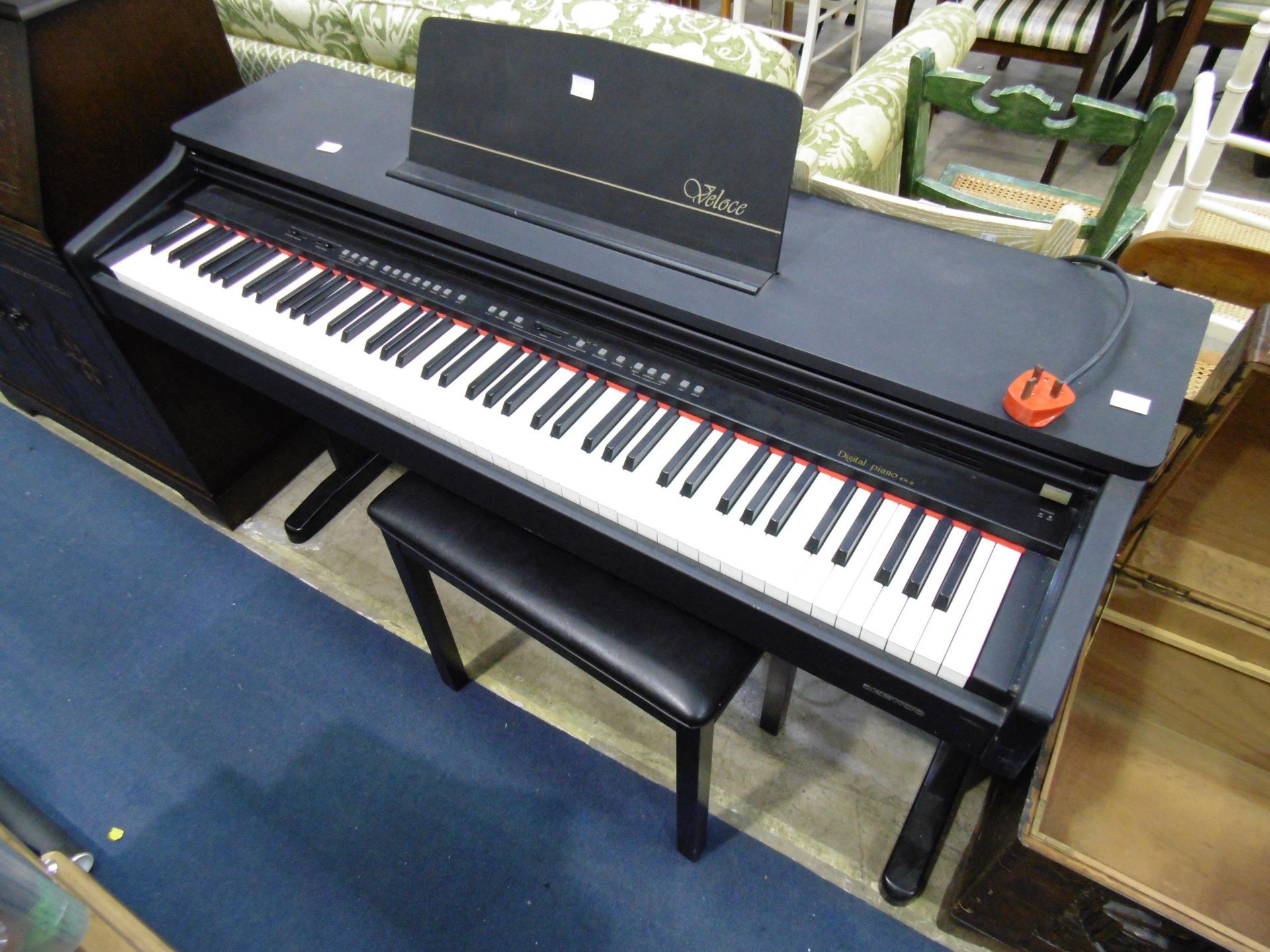 A Daewoo Veloce Digital Piano Model EX-Z with Stool (RRP in Region of £1000) (est £150-£200)