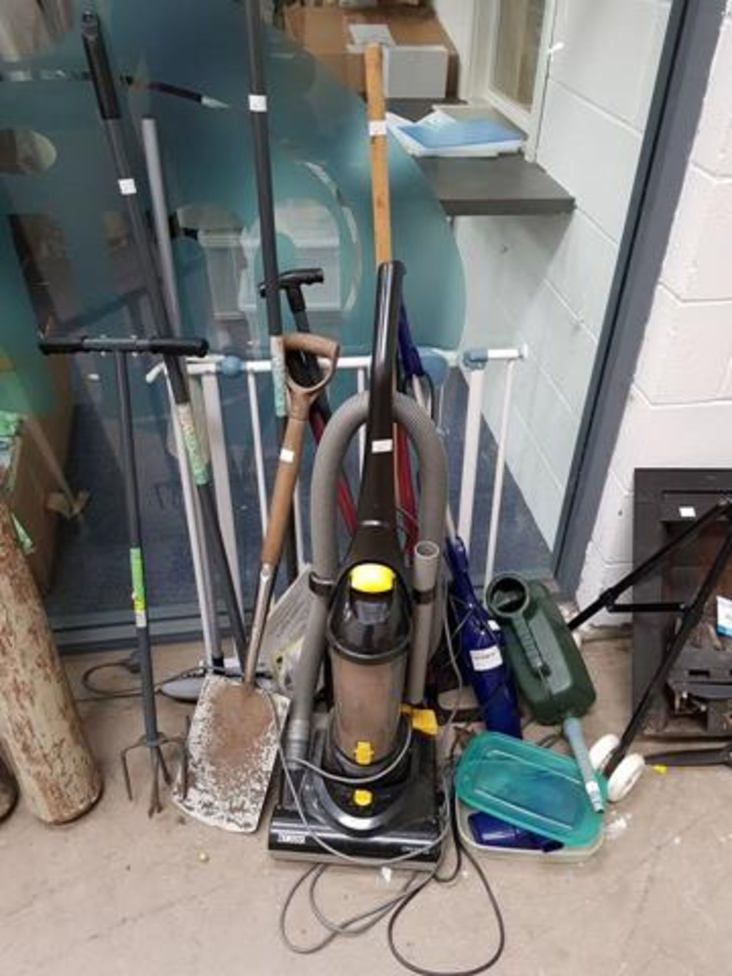 A Zanussi Vacuum Cleaner, a Bissell Vacuum and various Gardening Tools and Stairgate etc