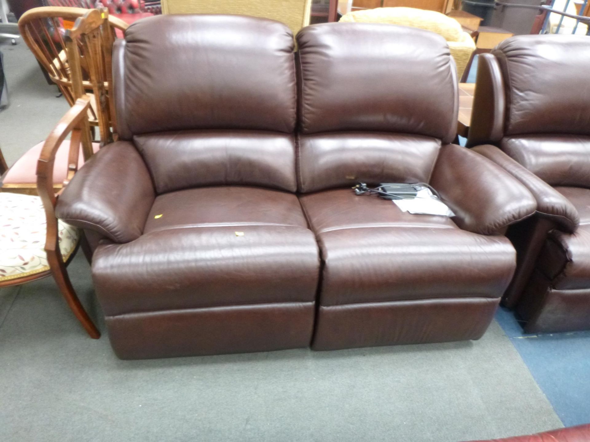 A brown Leather Sherborne Suite to include a two seat reclining sofa and a electric driven single - Image 2 of 3