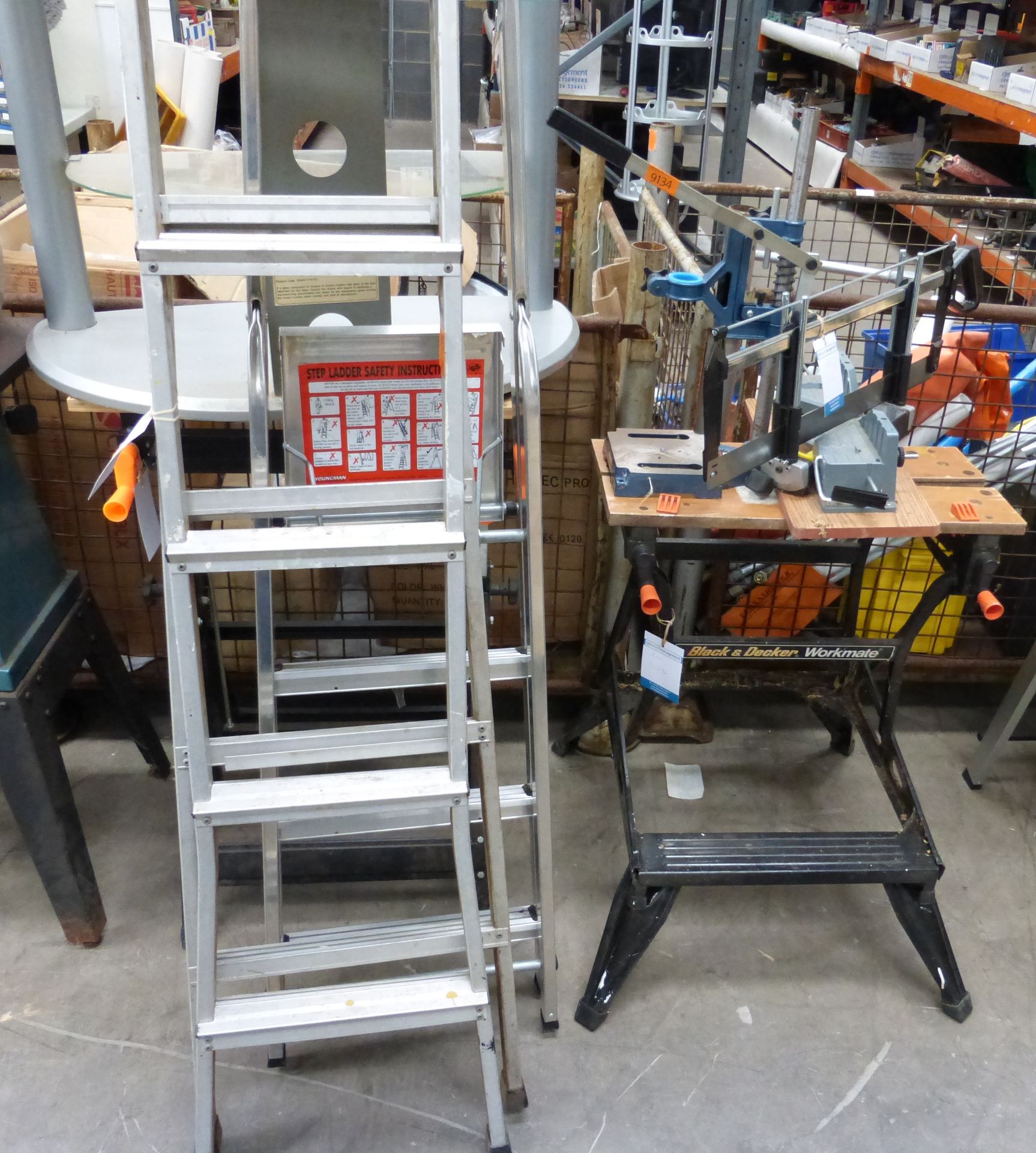 2 x Adjustable Work Benches, 2 x Step Ladders, 1 x Drill Stand, 1 x Mitre Saw.