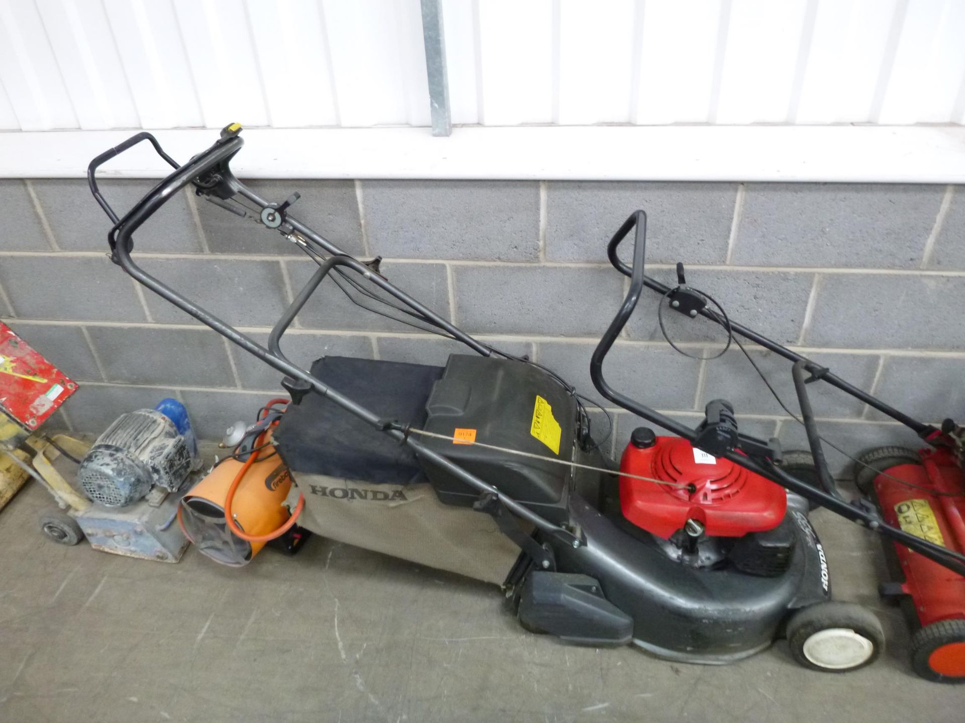 A Honda HRD535 QX 21'' Rear Roller Self Drive Mower