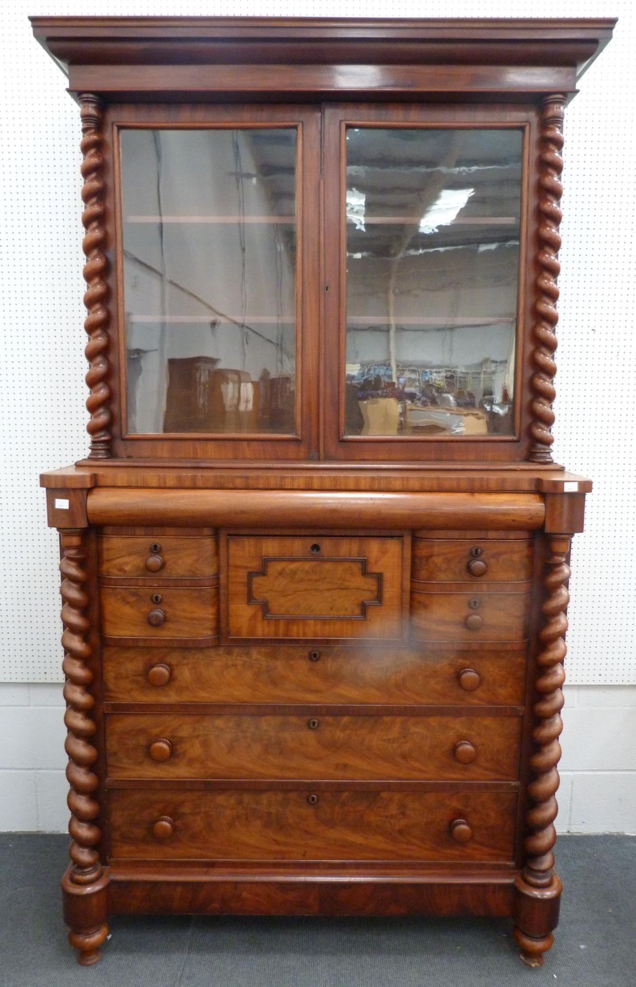 A large and impressive Victorian Mahogany Scottish Ogee Chest and Cabinet. The bookcase top with