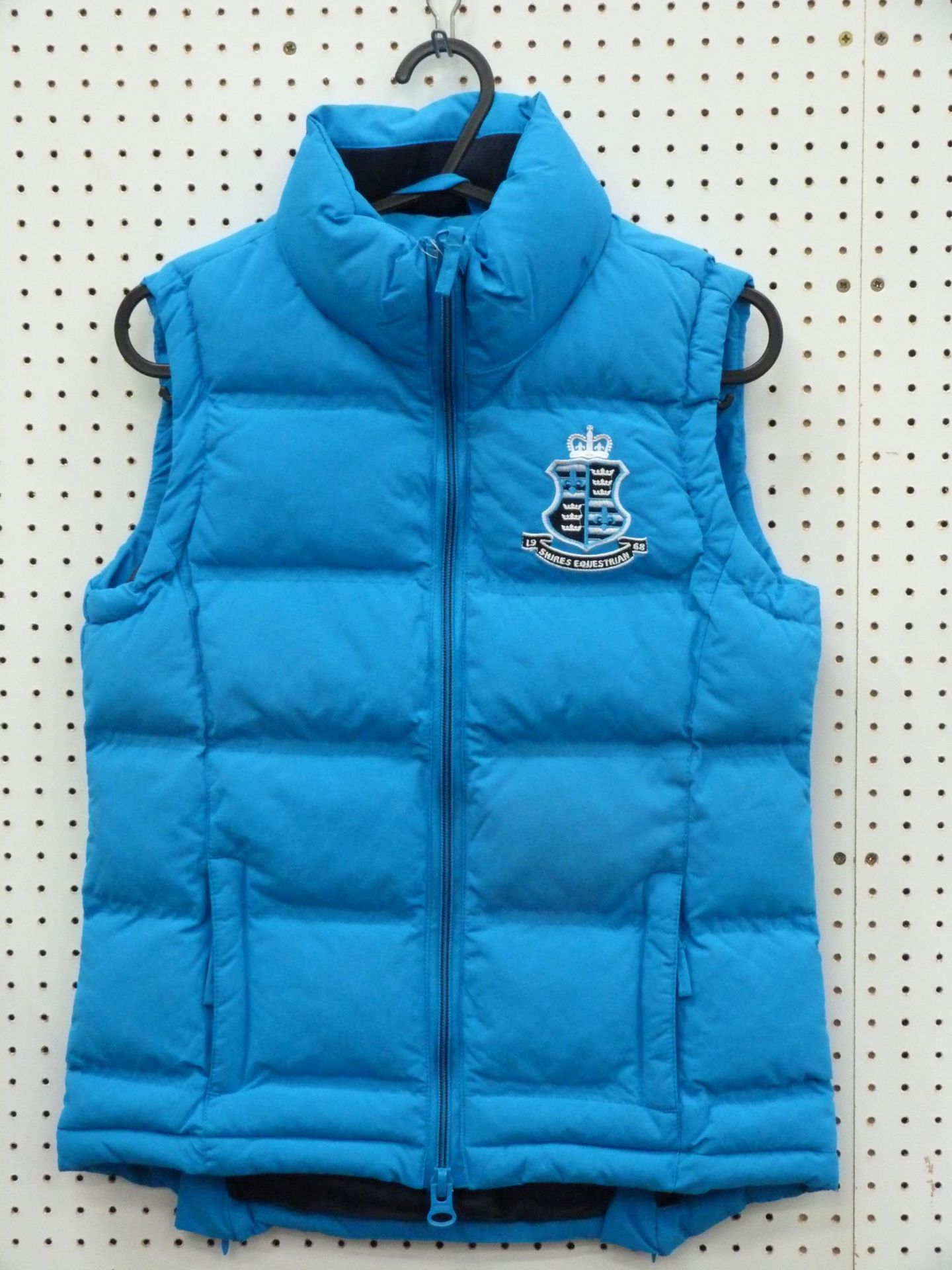 * Four Blue, New Shires Team Gilets, one X Small, one Small, two Medium. RRP £119.95 (4)