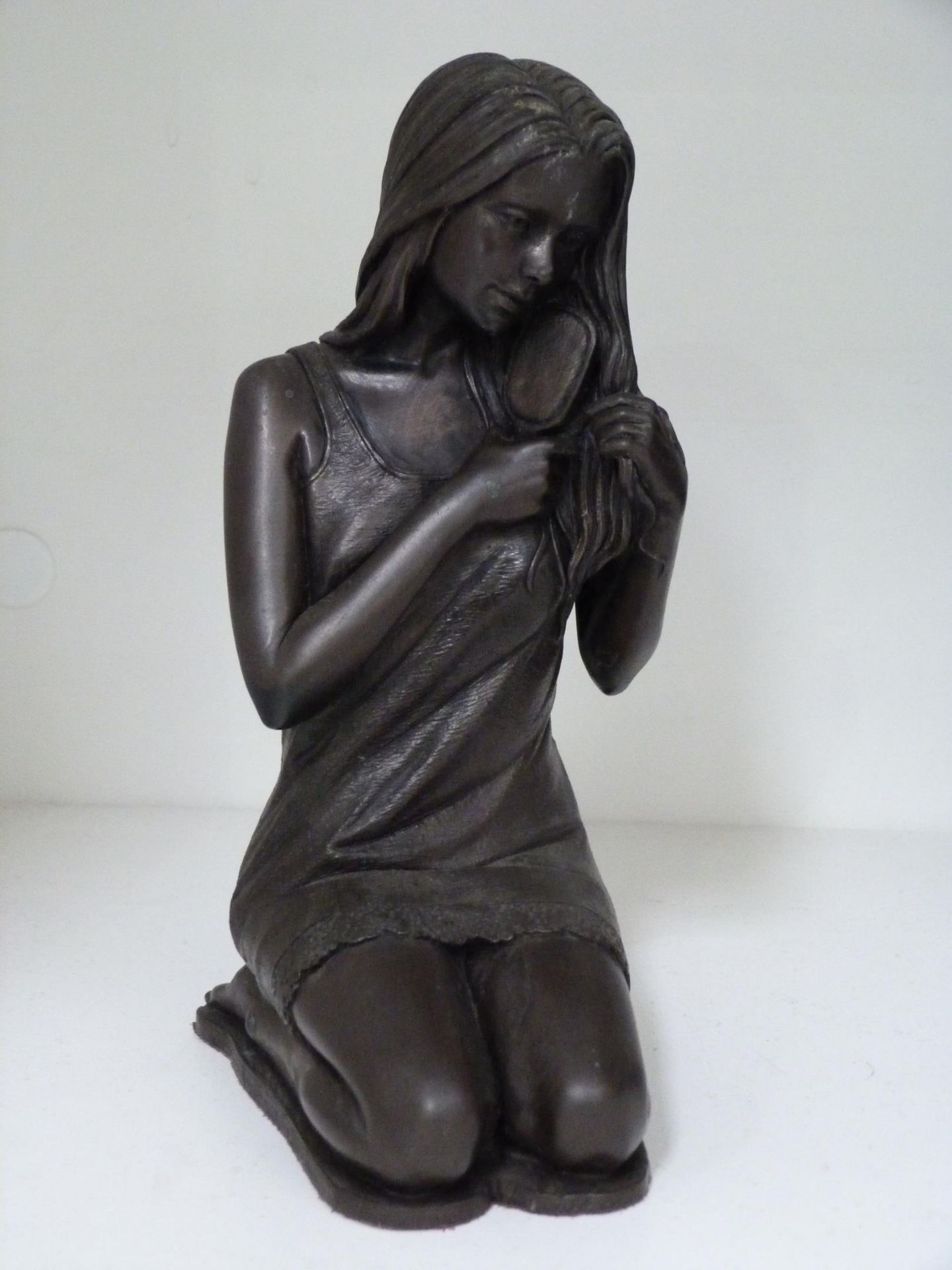 Two Bronze Effect Resin Lady Figurines of a nude woman and a woman brushing her hair (24cm & - Image 2 of 3