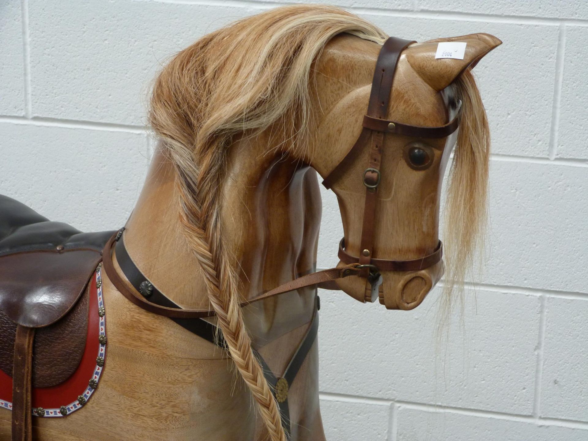 A Large Wooden Rocking horse with horse hair mane and tail with leather saddle, halter and brass - Image 2 of 5