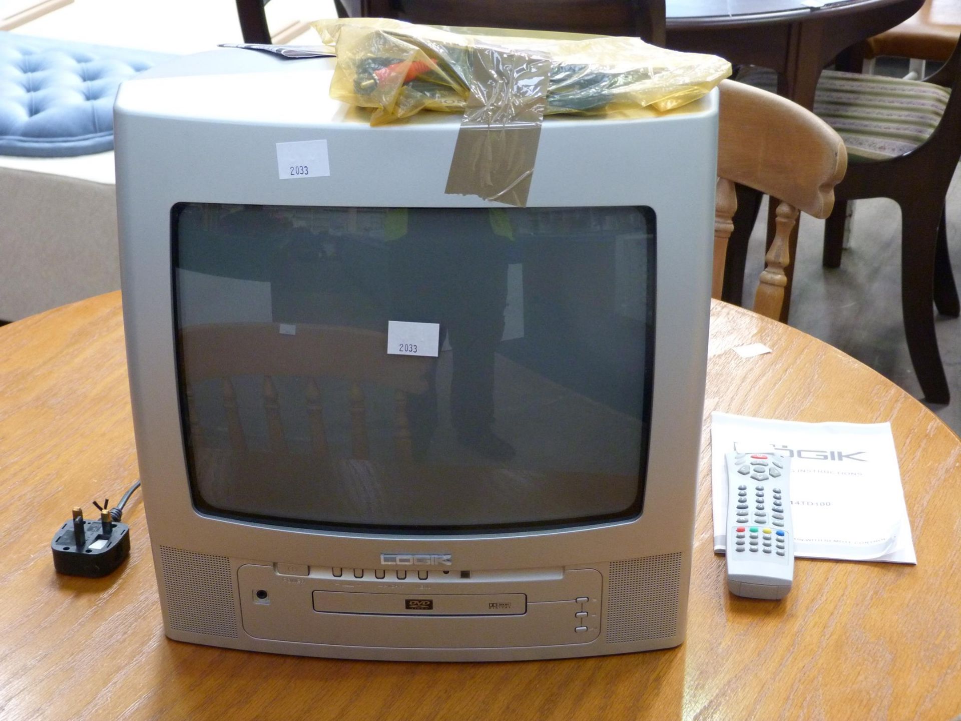 A Logic Colour Television Model L14TD100 in working Order- with remote (est £20-£40)