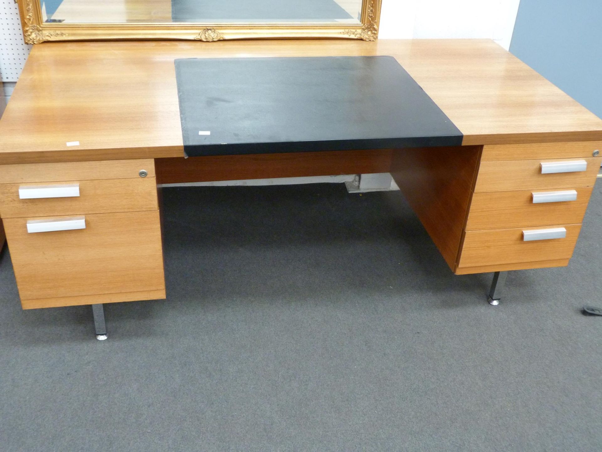 A large Office Desk with Black Faux Leather writing Insert, the desk has three Drawers to the