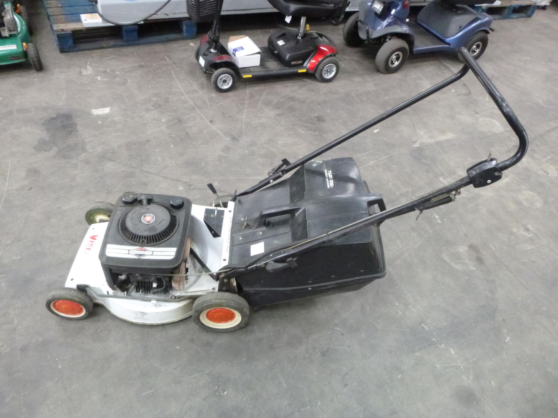 A Victor Mustang Push Mower