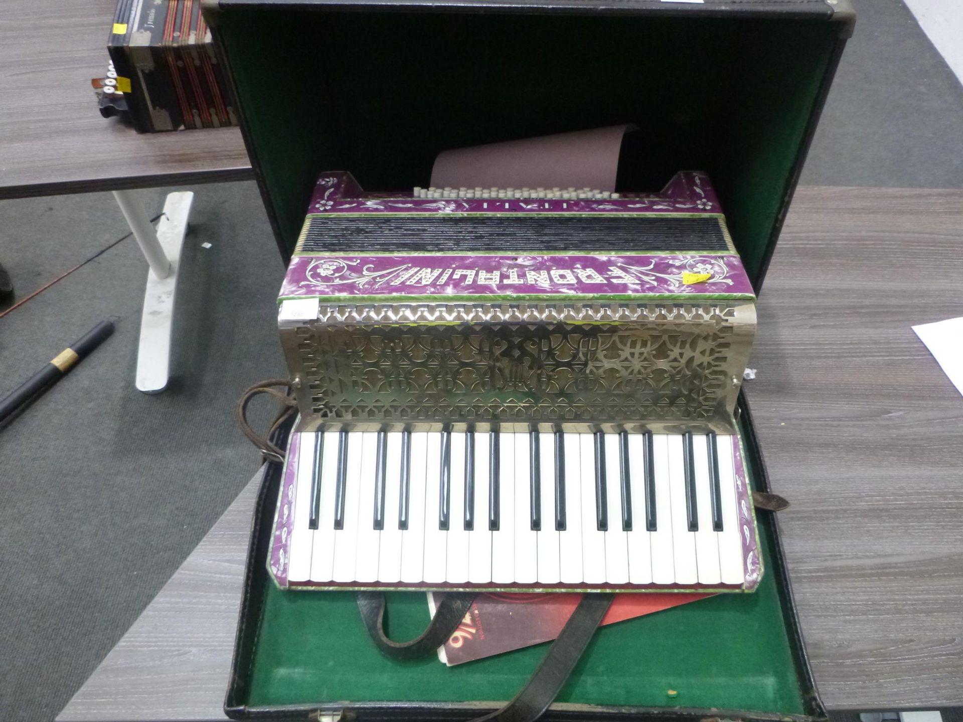 A full size Italia Frontalini Accordian - stamped number 787 in bespoke carry case (est. £50-£100)