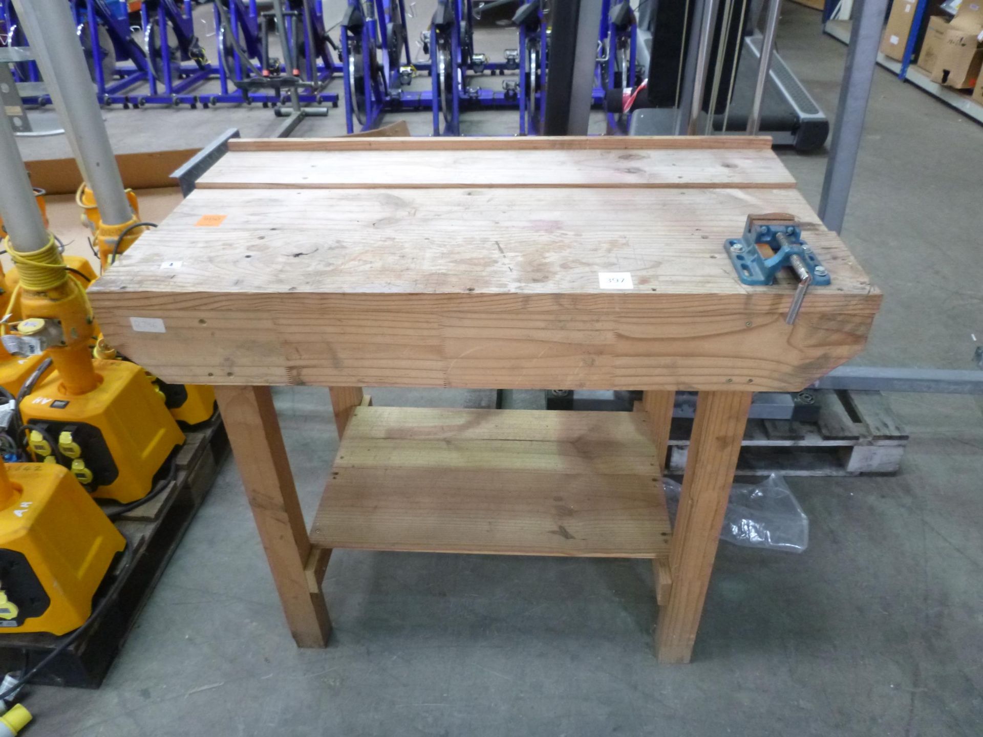 A small Wooden Carpenters Bench with Mounted Machine Vice. Please note there is a £5 Plus VAT Lift