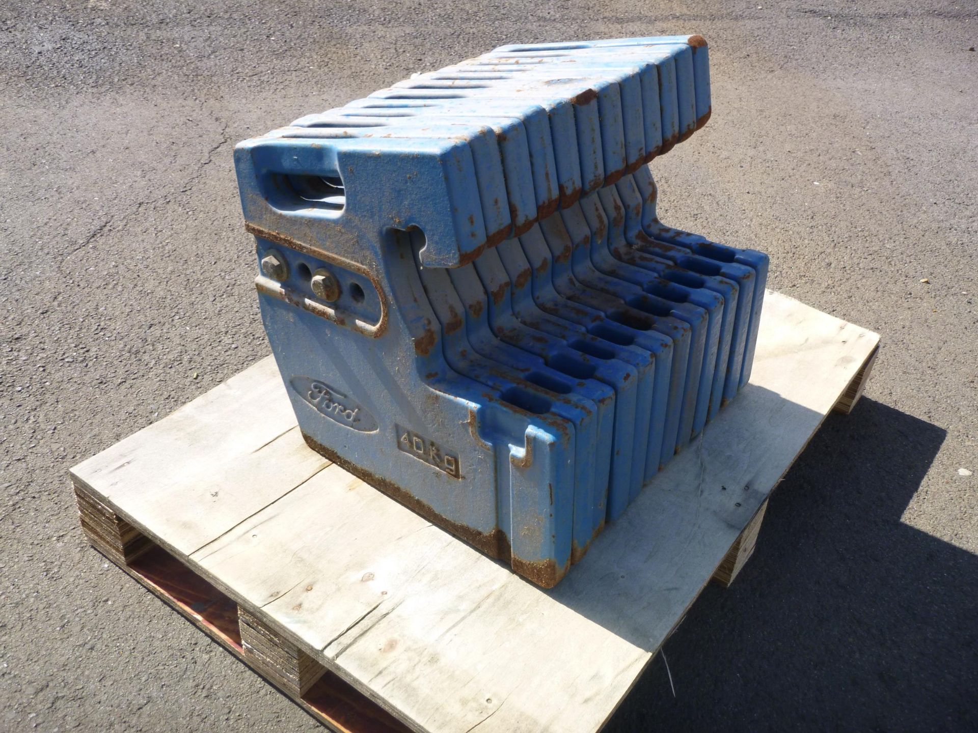 * A Set of 12 Ford 40Kg Wafer Weights.