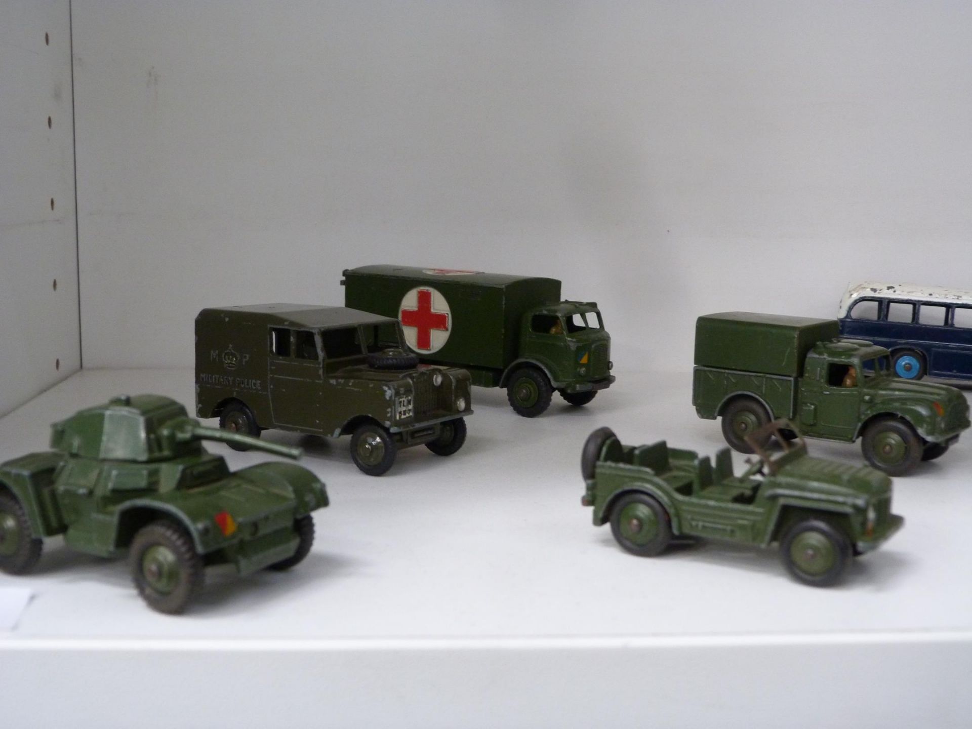 A shelf to feature a selection of Military Dinky Toys, a B.O.A.C Dinky Bus, Plastic Toy Soldiers and - Image 3 of 6