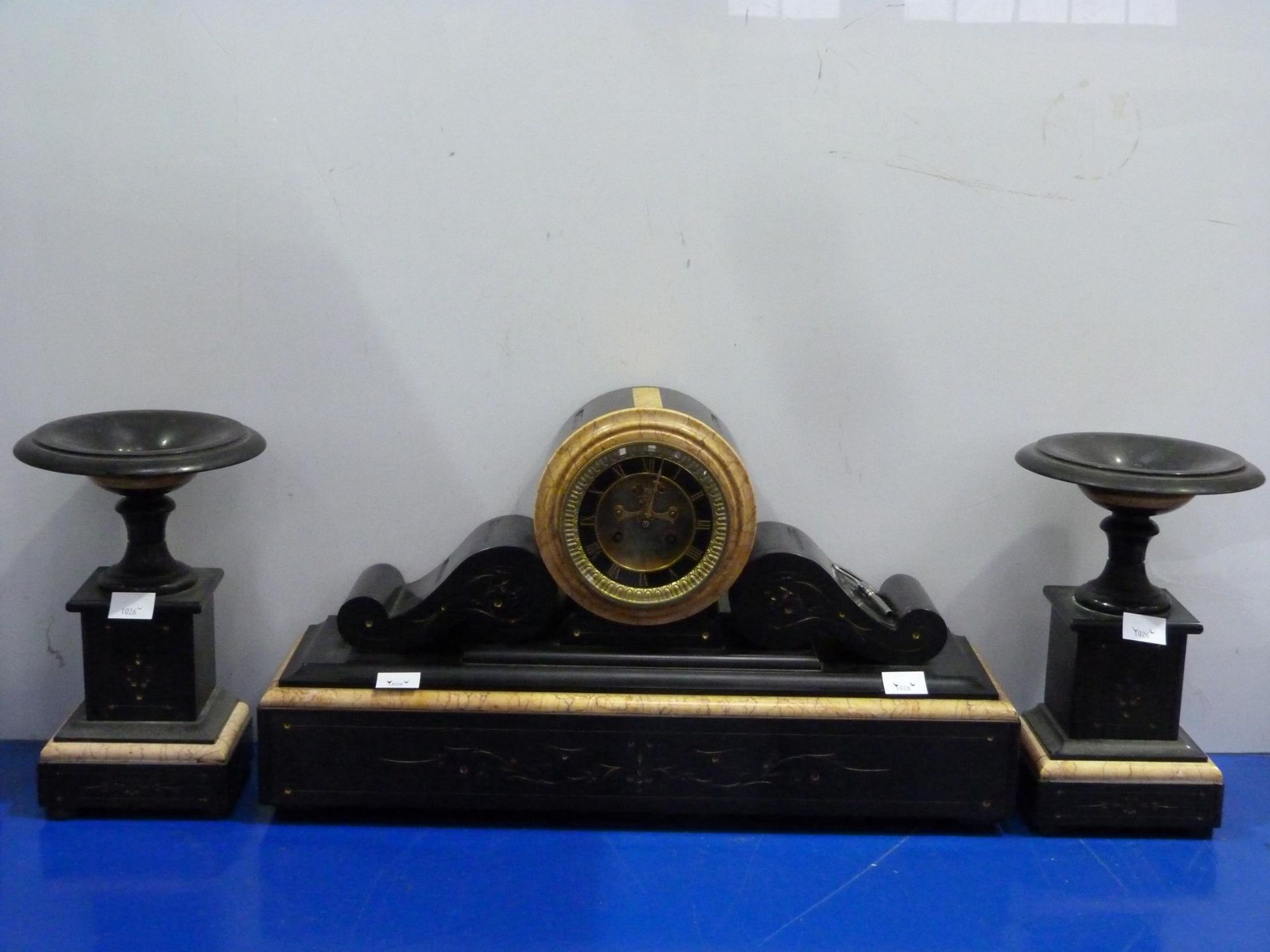 A J.Marti & CIE Three Piece Clock Garniture including a Slate & Marble Medaille De Bronze Mantle