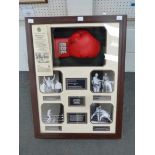 This is a Timed Online Auction on Bidspotter.co.uk, Click here to bid. A Boxing Glove Signed by