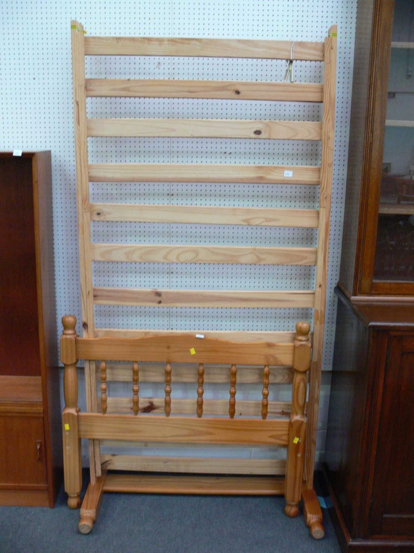 A single, Pine Bed frame with turned columns to headboard. (Est. £30 - £50)