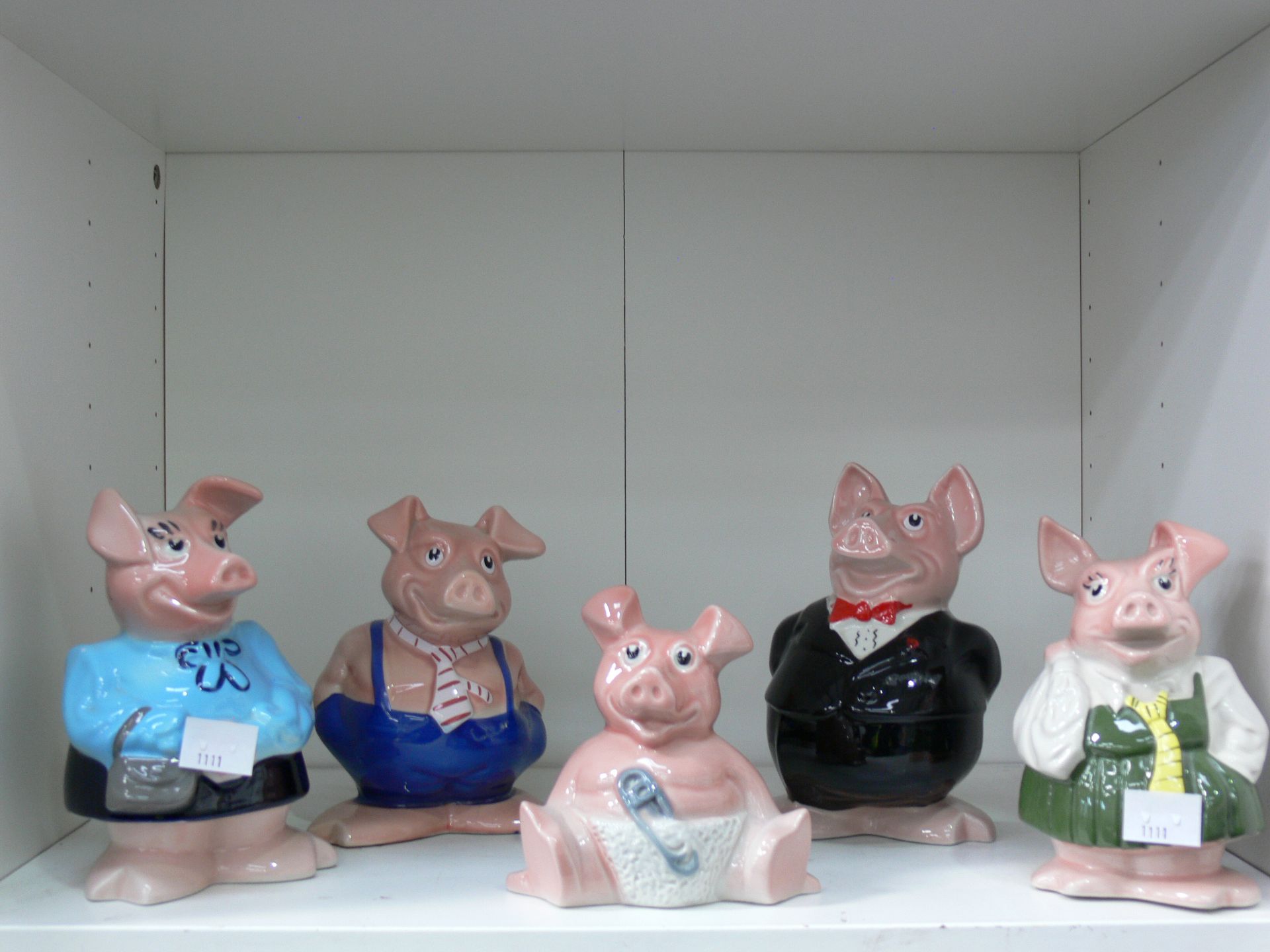 Five 'Wade' ceramic Natwest Pigs (Est. £30- £50)