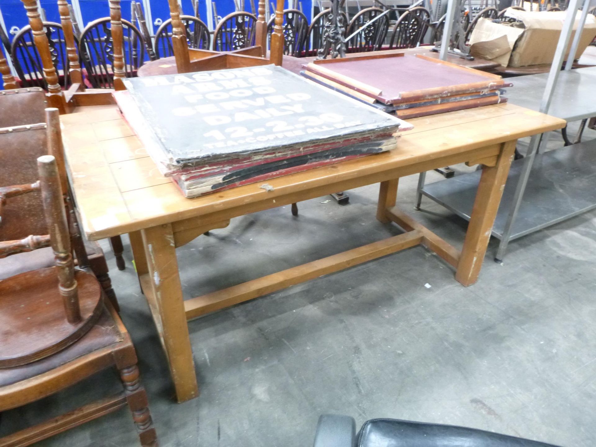 A Pub/Cafe Table together with various Pub Signage.