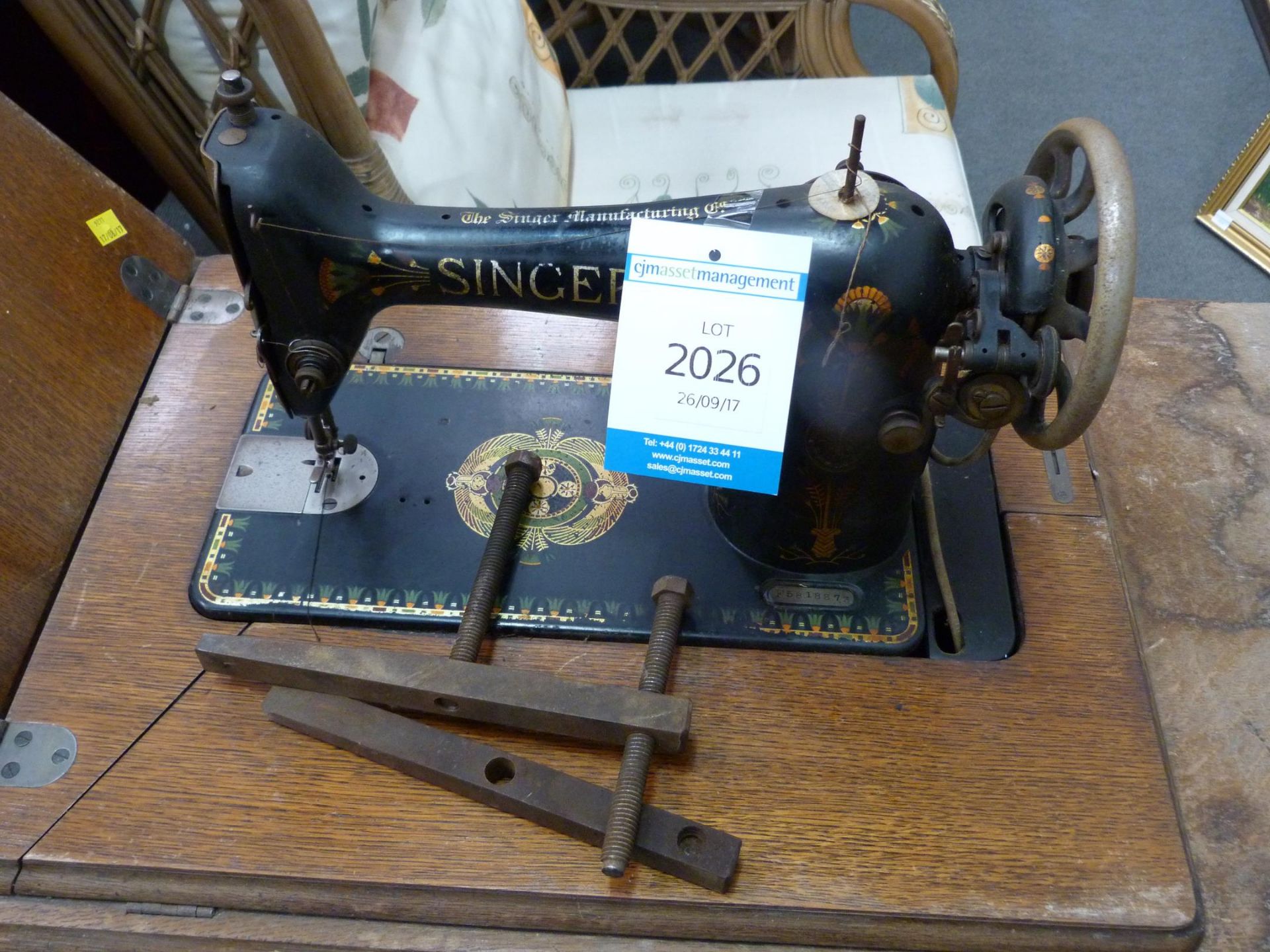 An early Treadle Singer Sewing Machine with fold down top and side, with four pullout drawers ( - Image 2 of 3