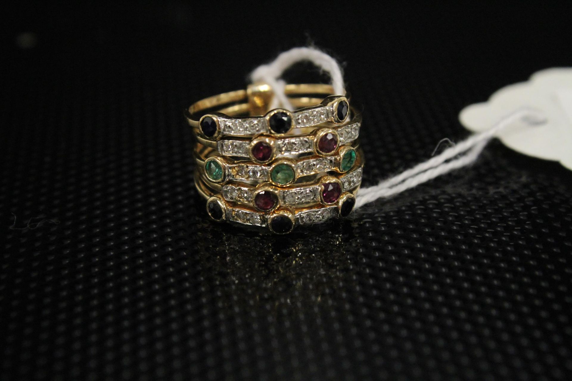 An unusual 14ct Gold Ring as 5 conjoined rings each set with Diamonds and other stones, size M - Image 2 of 4