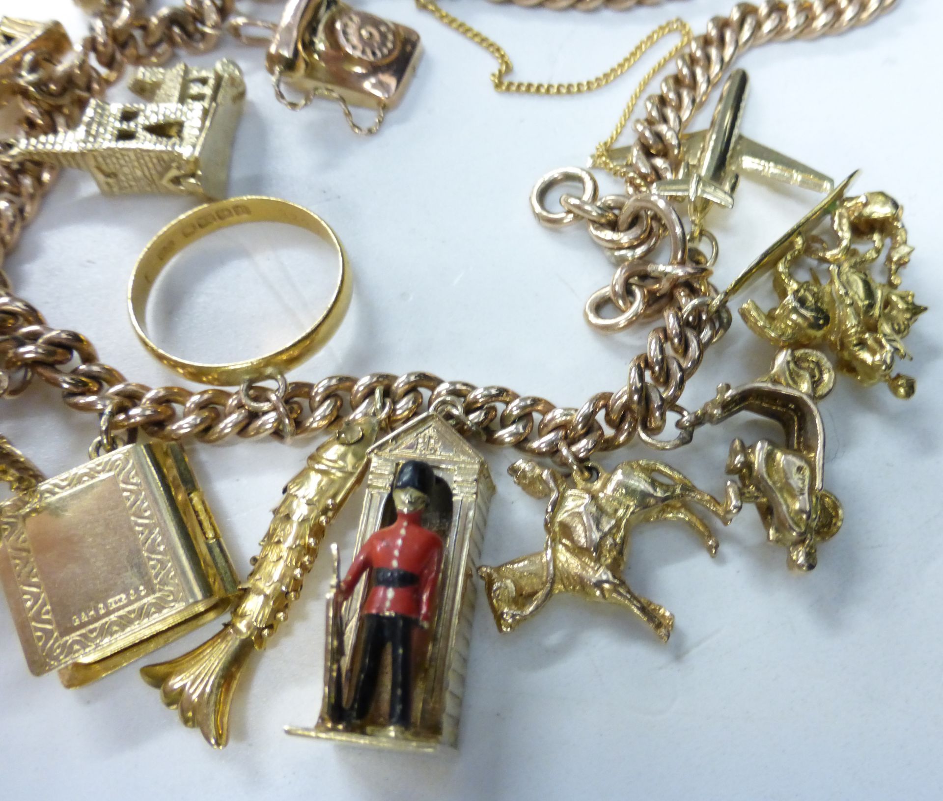 A 9ct Gold Watch Albert/Charm Bracelet Set with eighteen mostly 9ct charms (not all hallmarked) - Image 3 of 3