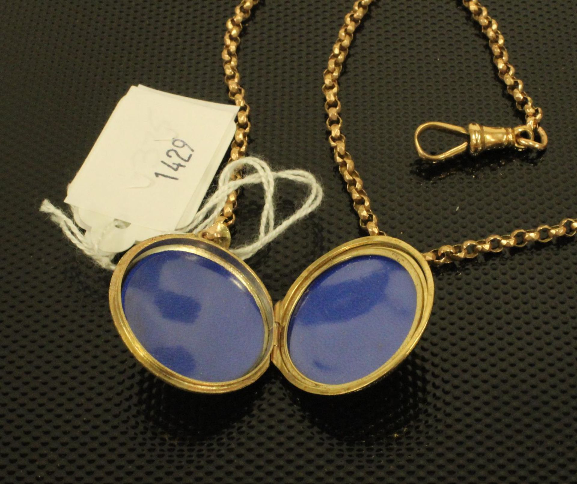 A 9ct Gold Circular Locket set on an 18ct Gold 54cms Chain. (chain approx 8gms) (Est. £150 - £300) - Image 2 of 2
