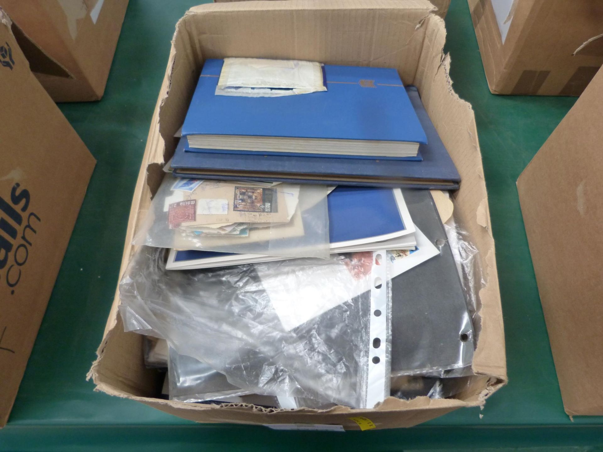 Stamps. A box of Stamp Albums, Stock Albums, Stamps in envelopes. (Est. £50 - £60)