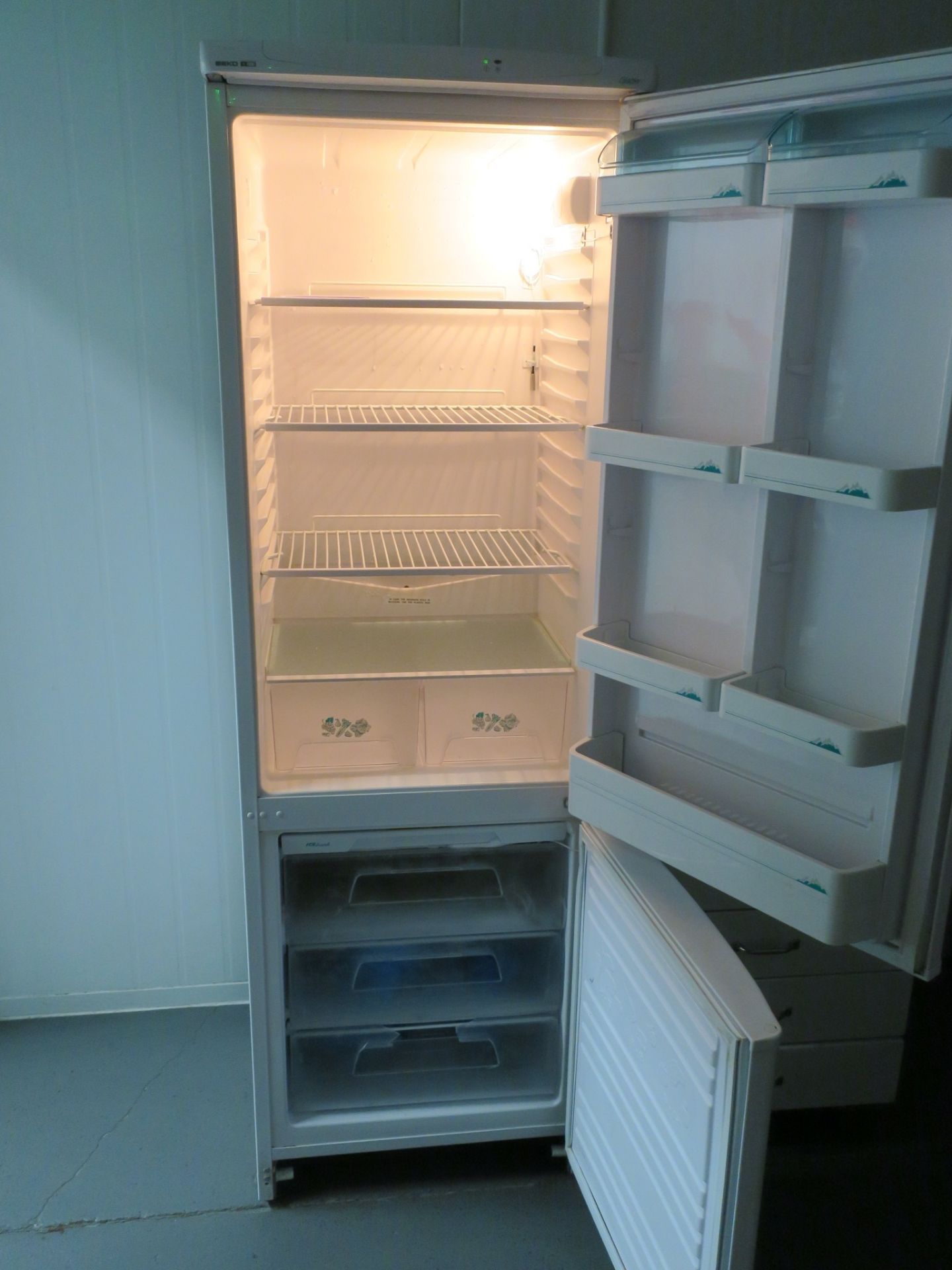 * Steel Double Door Cabinet containing Cleaning Equipment and Products and a Beko Glacier Fridge - Image 4 of 4