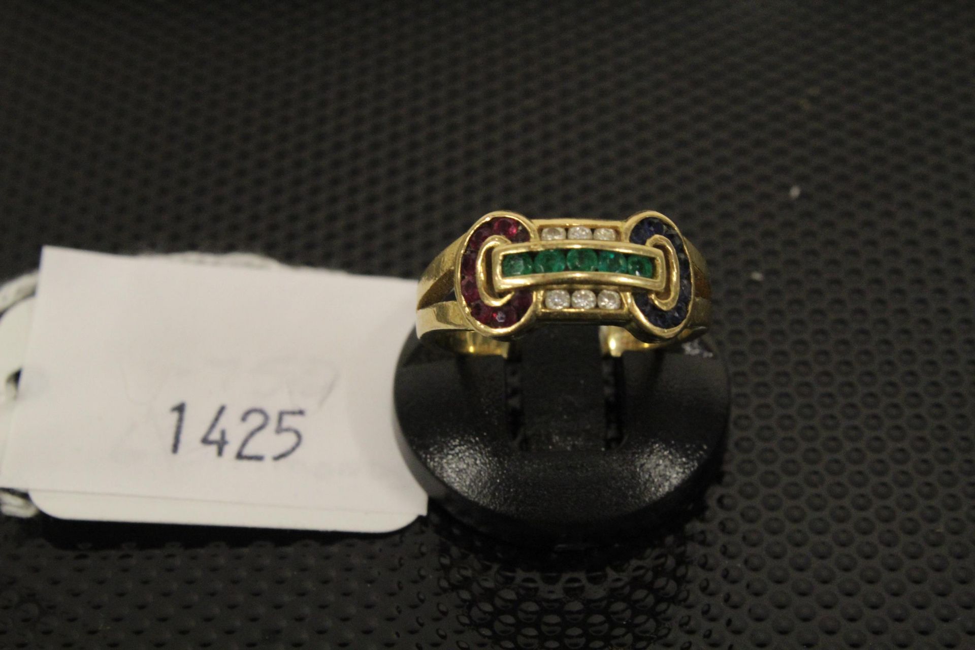 An Art Deco design 18ct Gold Ring set with Rubies and Emeralds & Diamonds size N/O. (Est. £200 -£