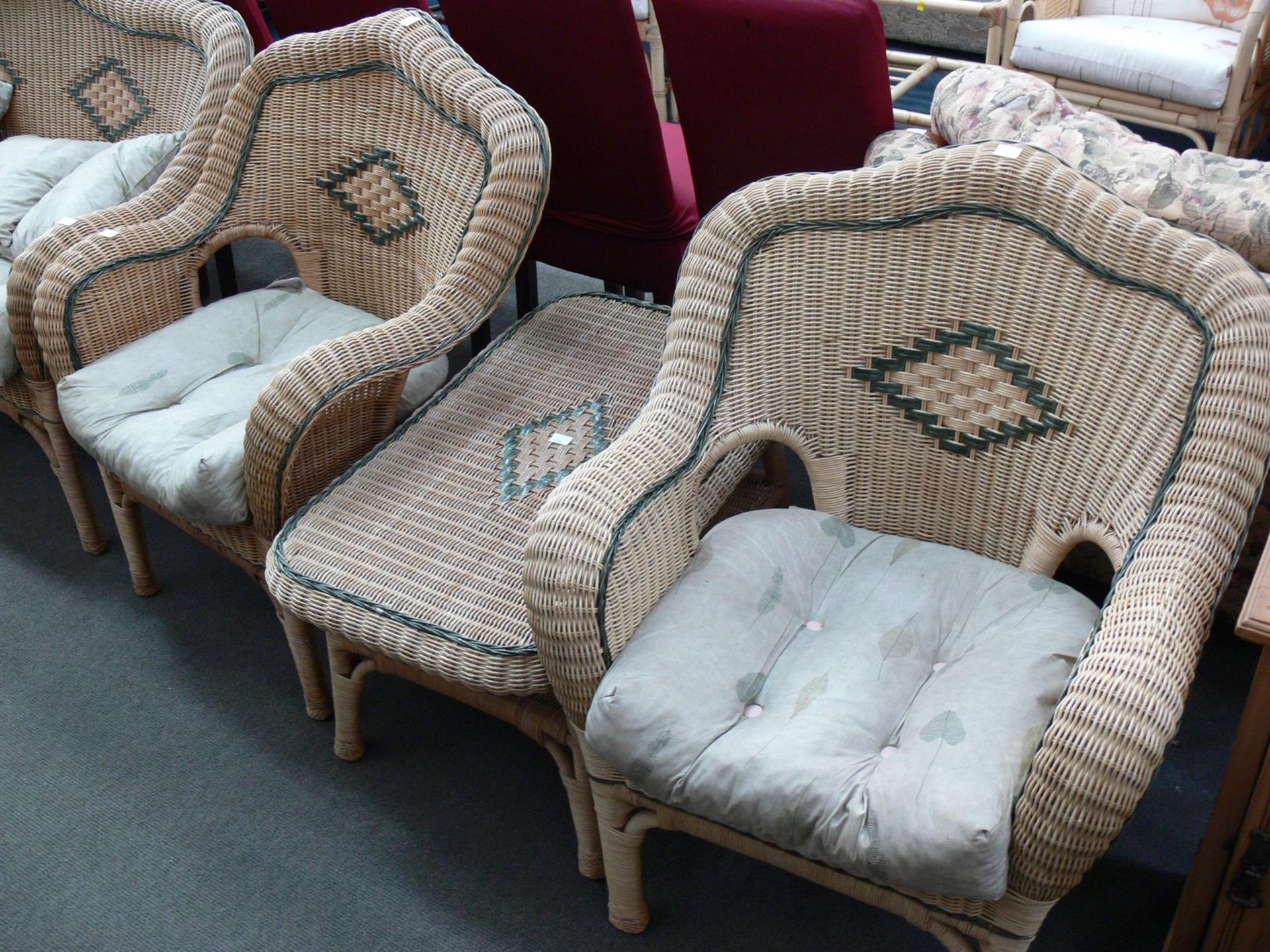 A Cane two seat Conservatory Settee, two Single Chairs, with fabric Cushions, Table, (4) (Est. £40 -