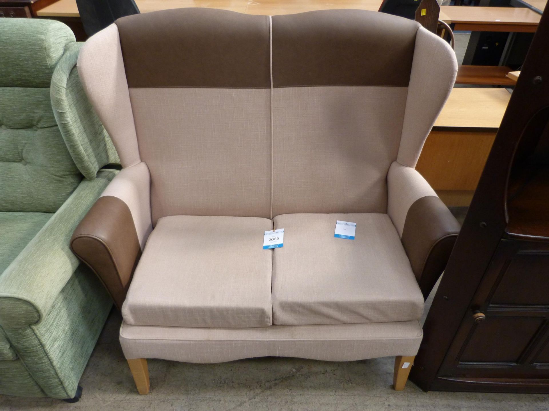 A High Wing Back Shackletons Two Seater Banbury Sofa (est £50-£70)