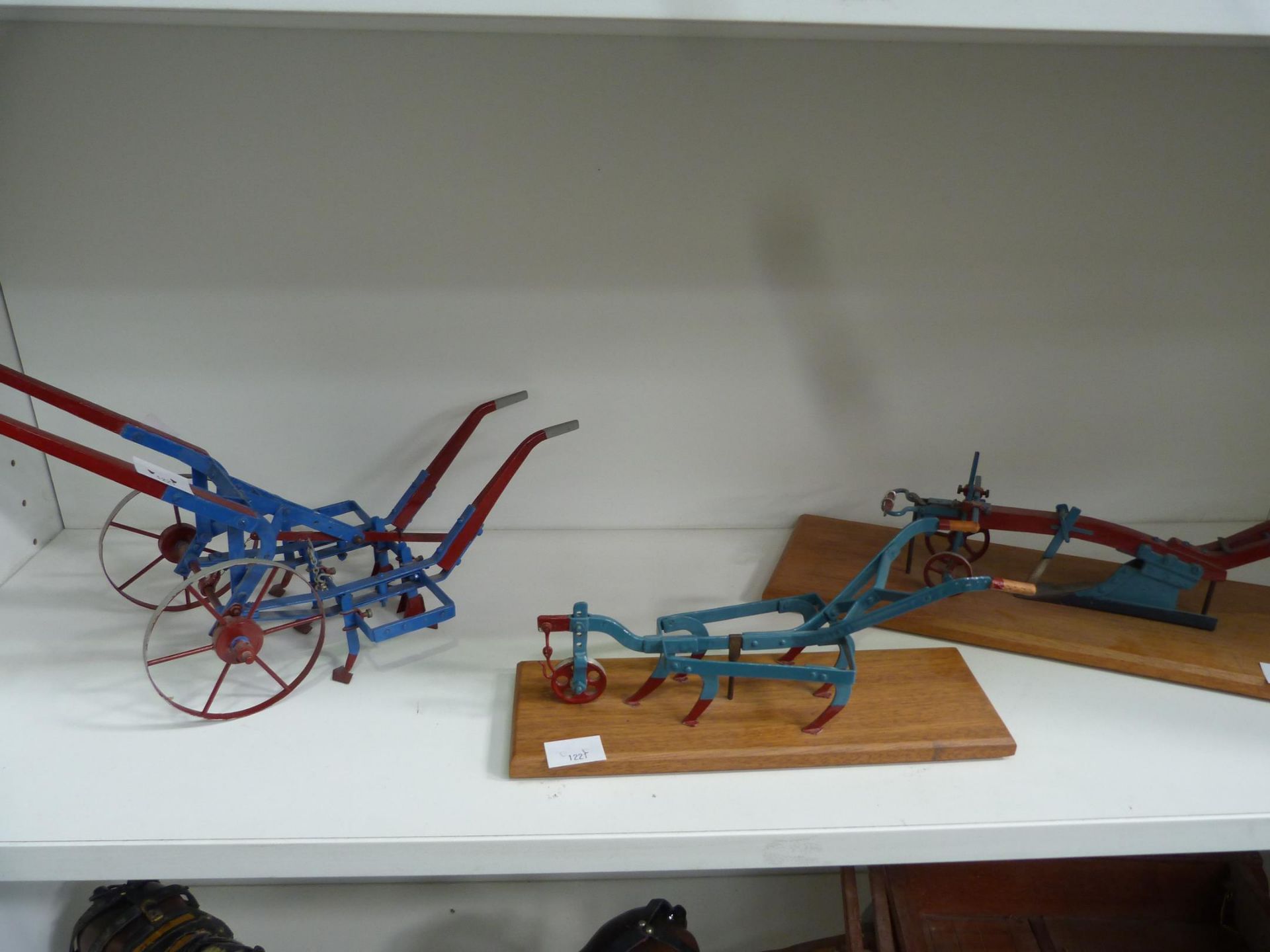 Three Metal Craft Early Ploughs, two mounted on bases (3) (est £20-£40)