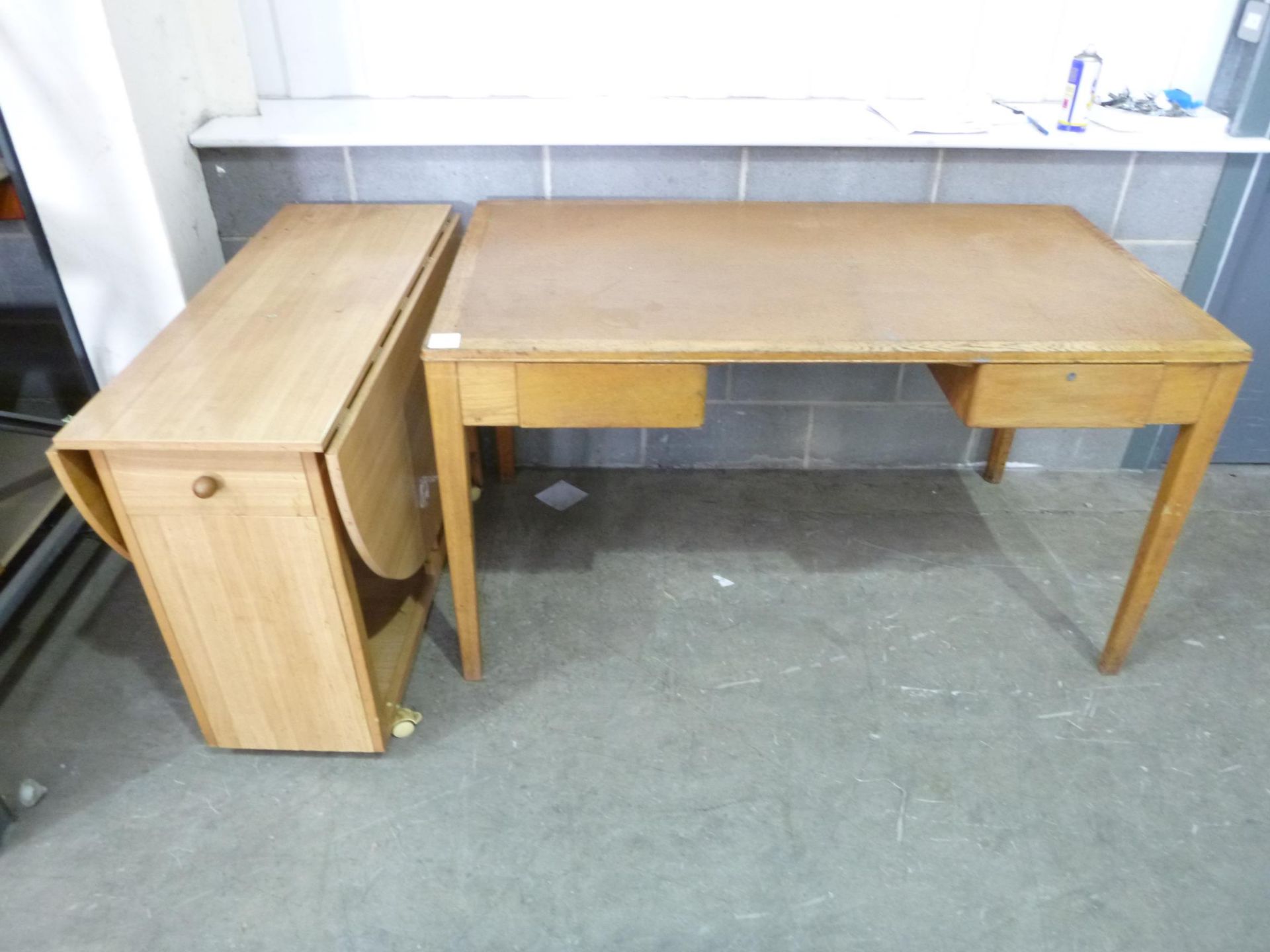 A Small Drop Leaf Table and a Desk. Please note there is a £5 Plus VAT Lift Out Fee on this lot.