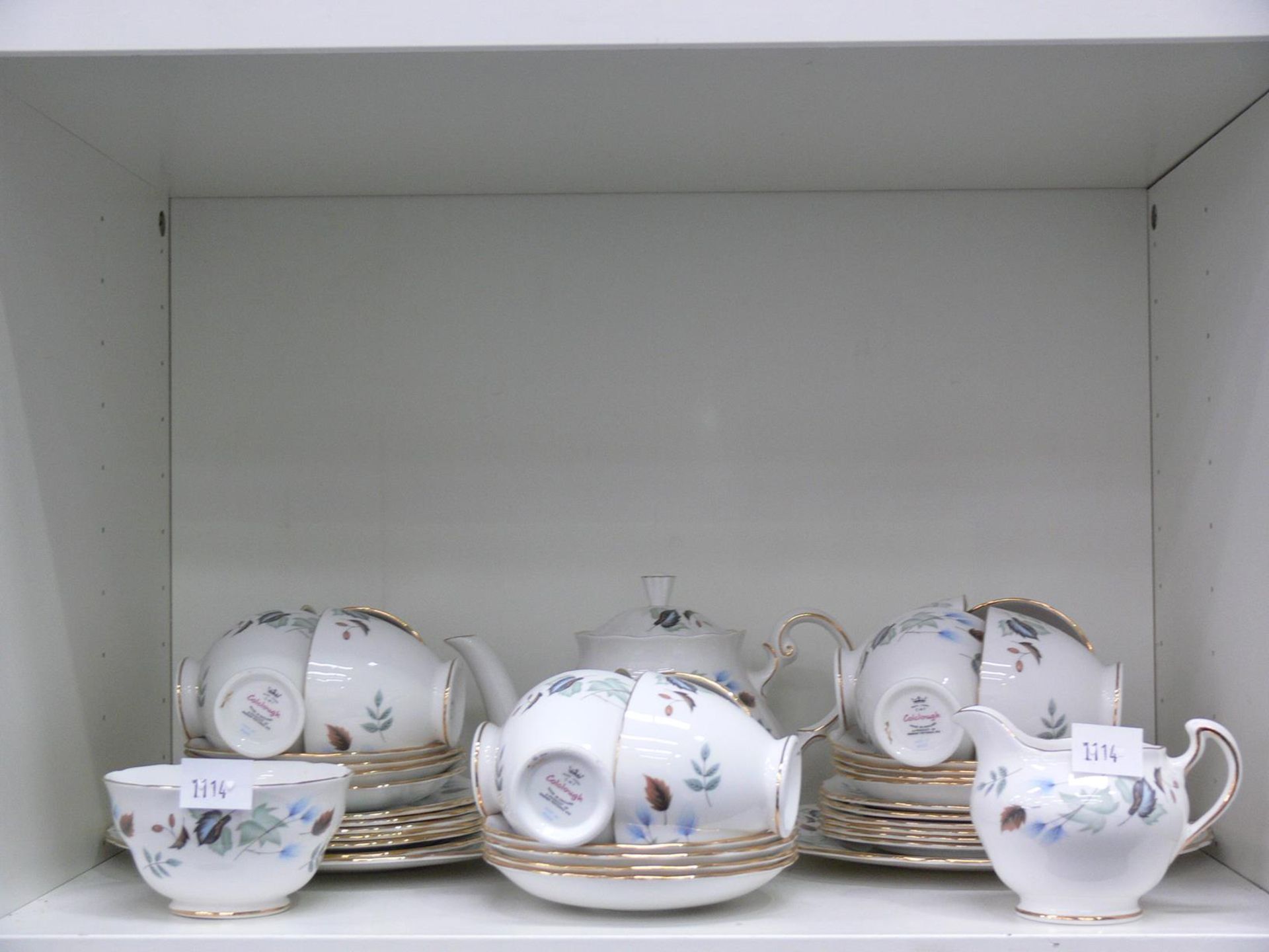 Five shelves to contain an assortment of Tea Services to include Colclough (40+), Alfred Meakin '