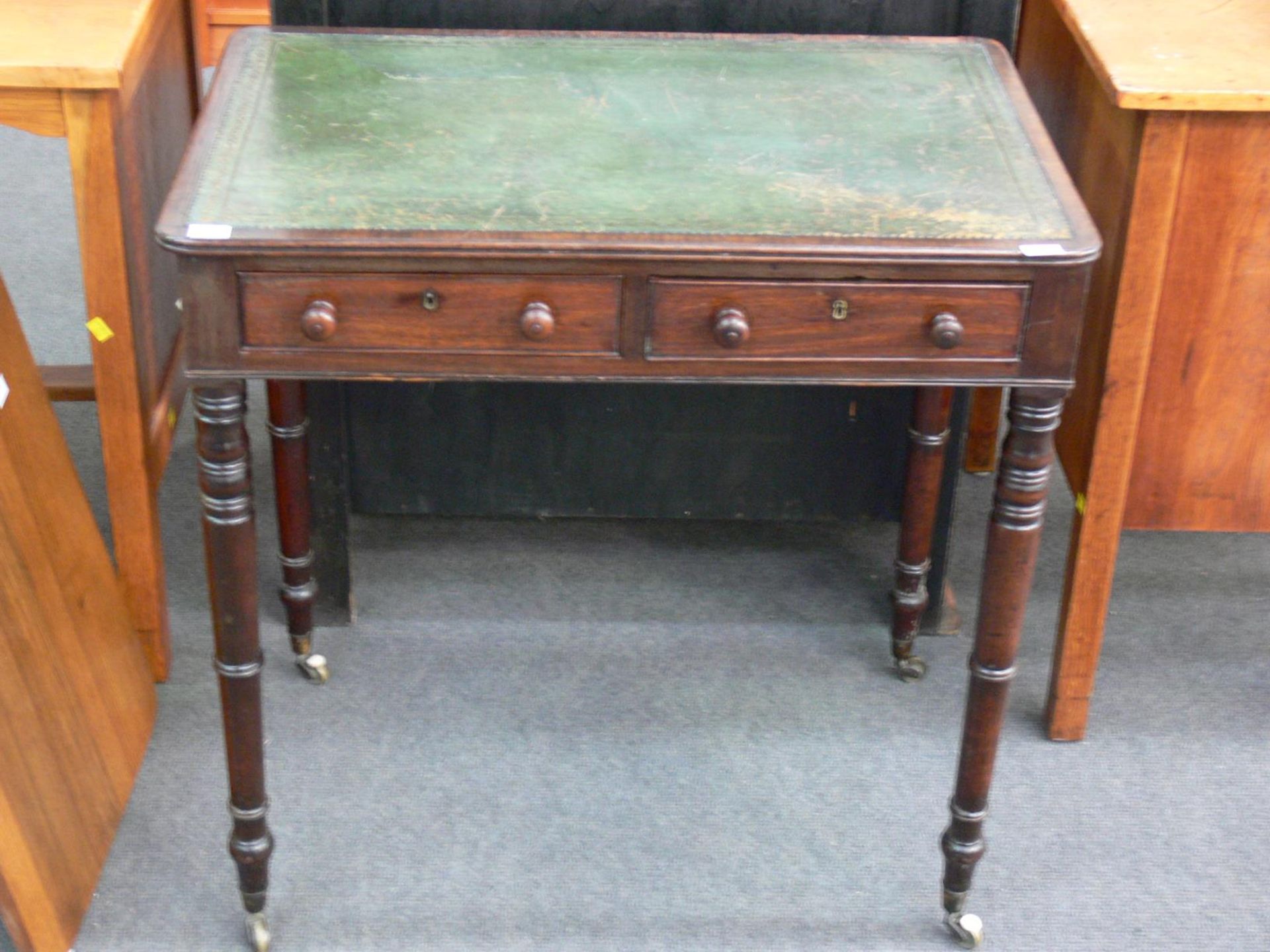 Writing Desk with green 'Leather' inlaid surface on tapering turned legs terminating in original