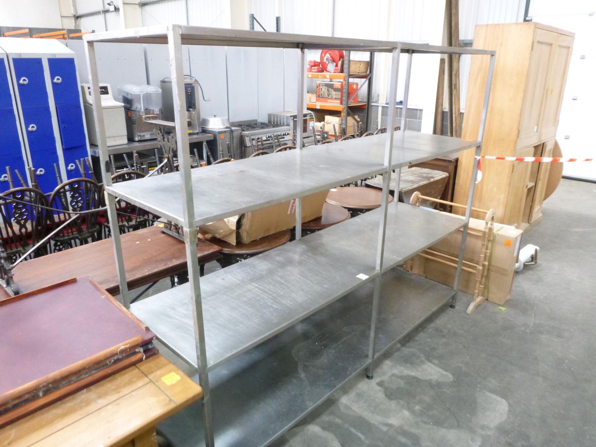 A large 3 Tier Stainless Steel Rack. Please note there is a £5 plus Vat lift out fee on this lot.