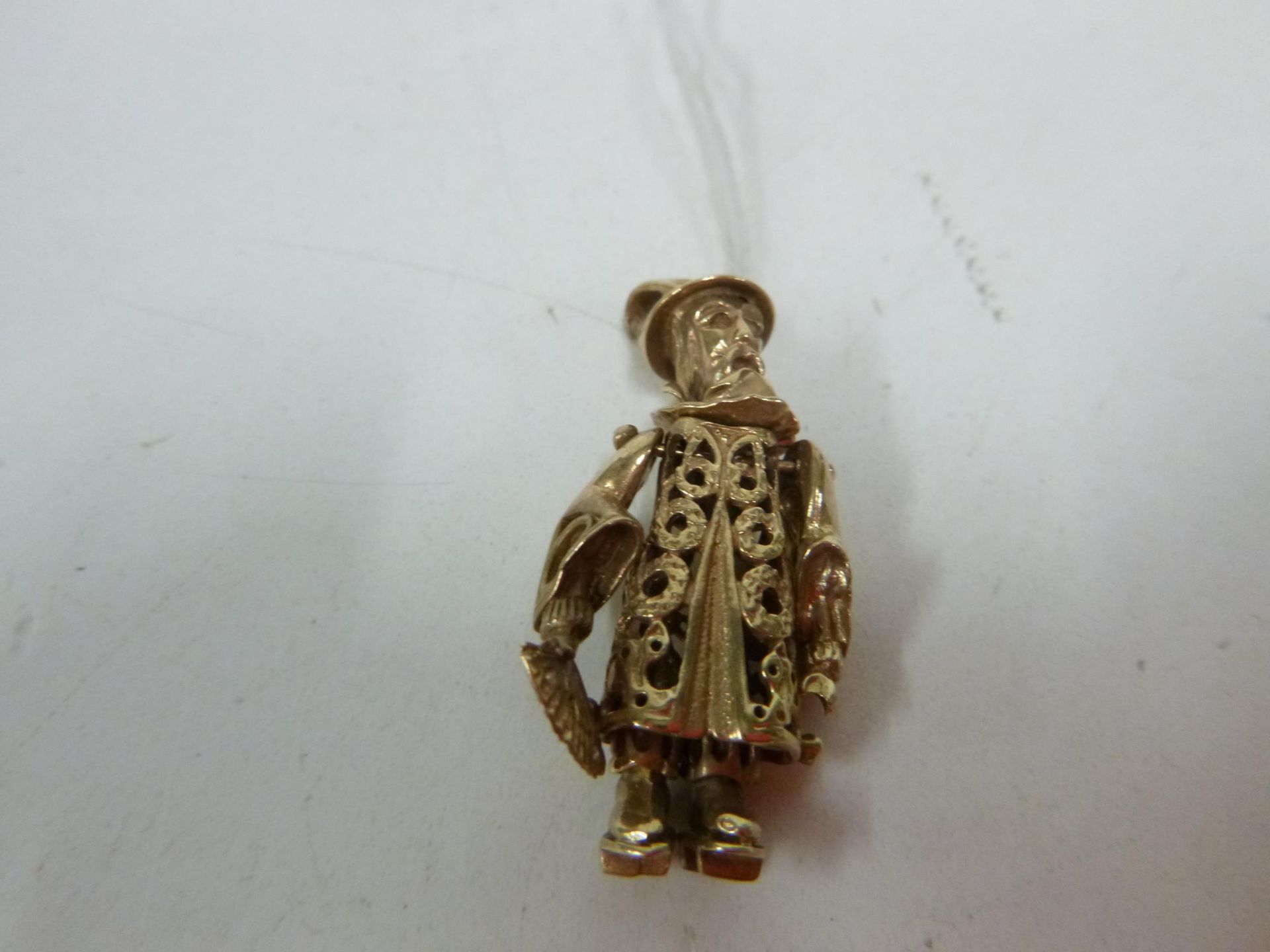 A 9ct (Stamped 375) Gold Articulated Oriental Figure, Weighing Approx 10g, 3.5cm (Est. £120 - £160)