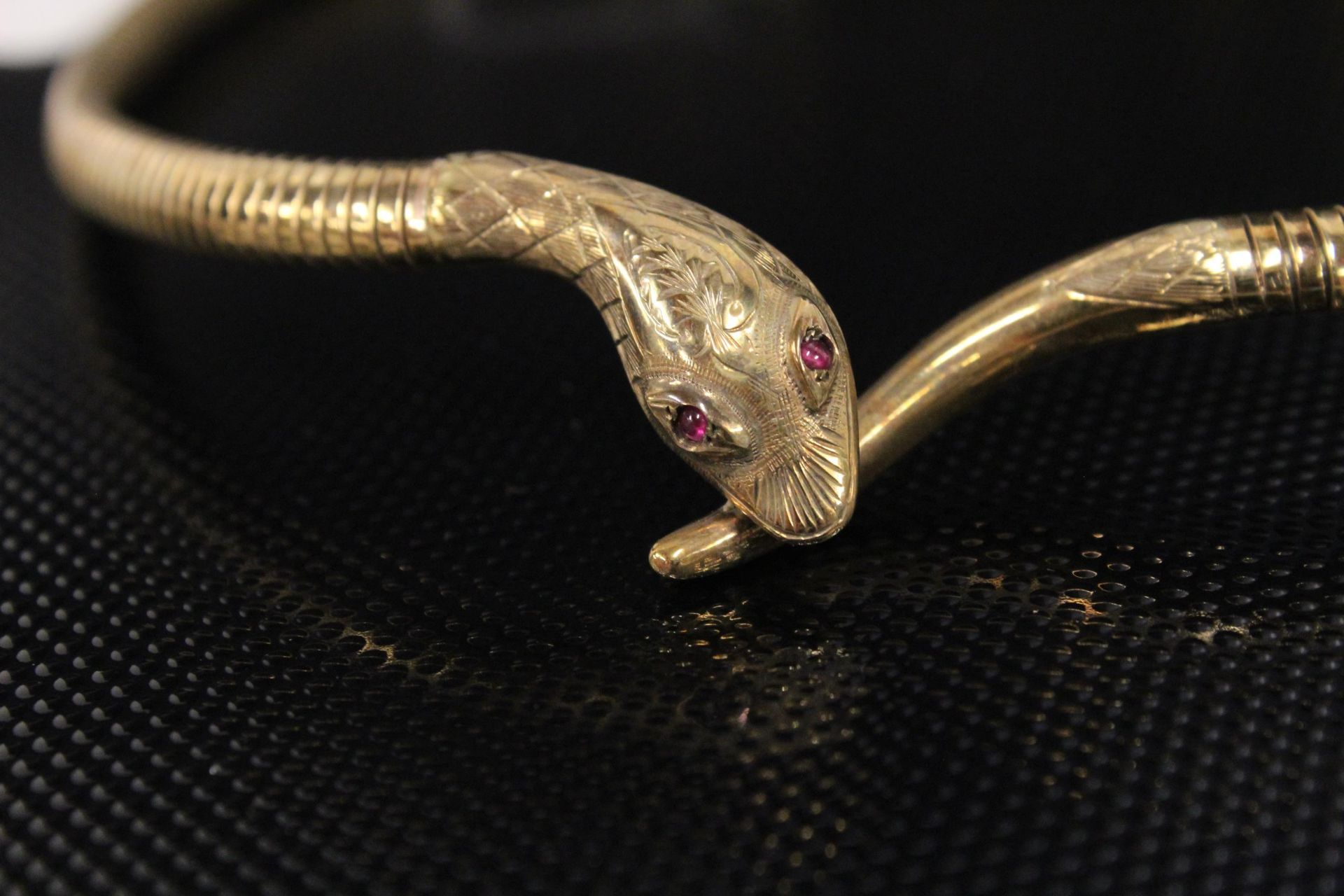 A 9ct Gold fancy Necklet as a snake set with Ruby (?) eyes. 30gms cased (Est.£300 - £400) - Image 3 of 4