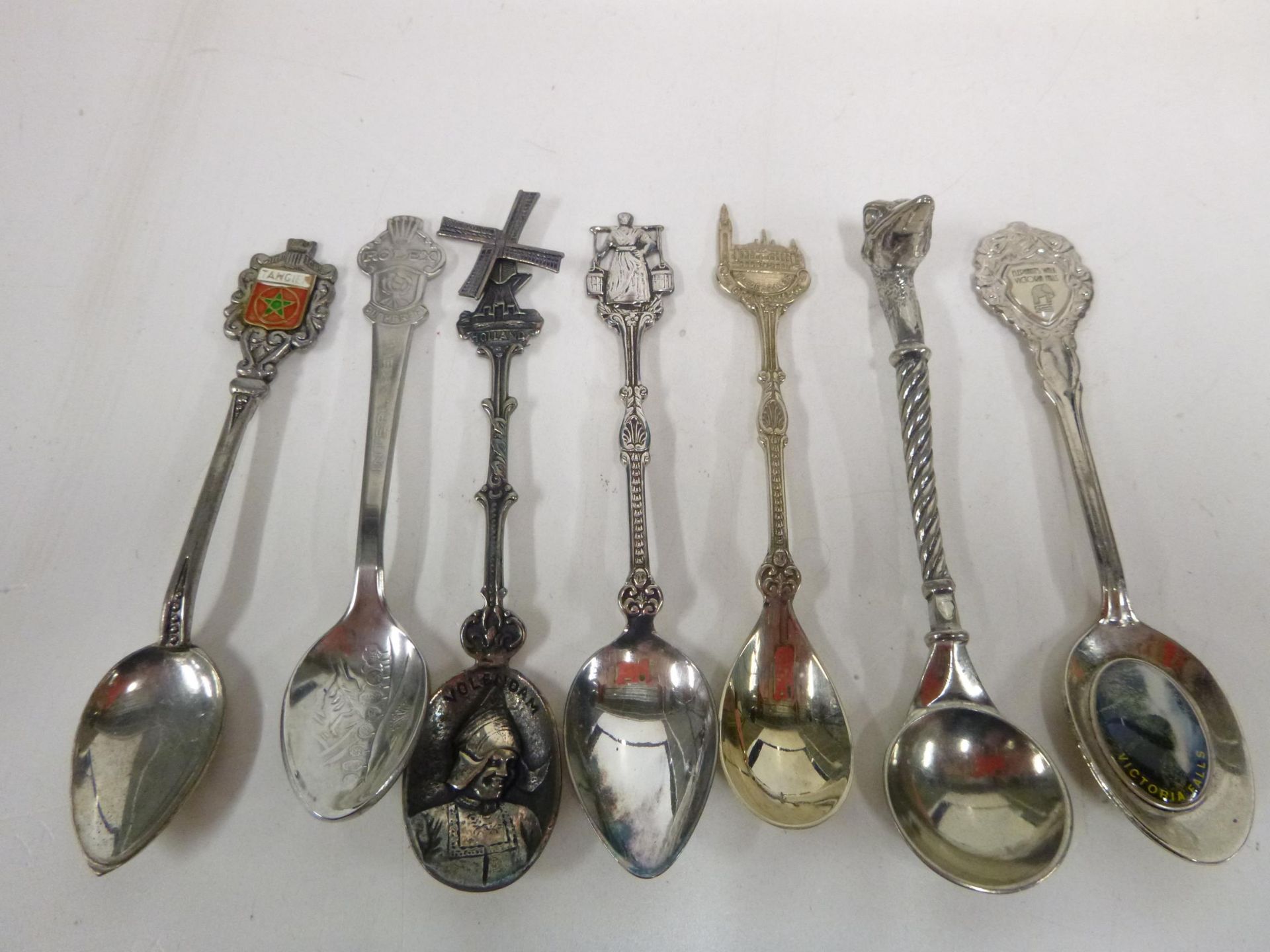 A collection of 32 Souvenir/Collectors Spoons. A number of which are Silver Plated to include