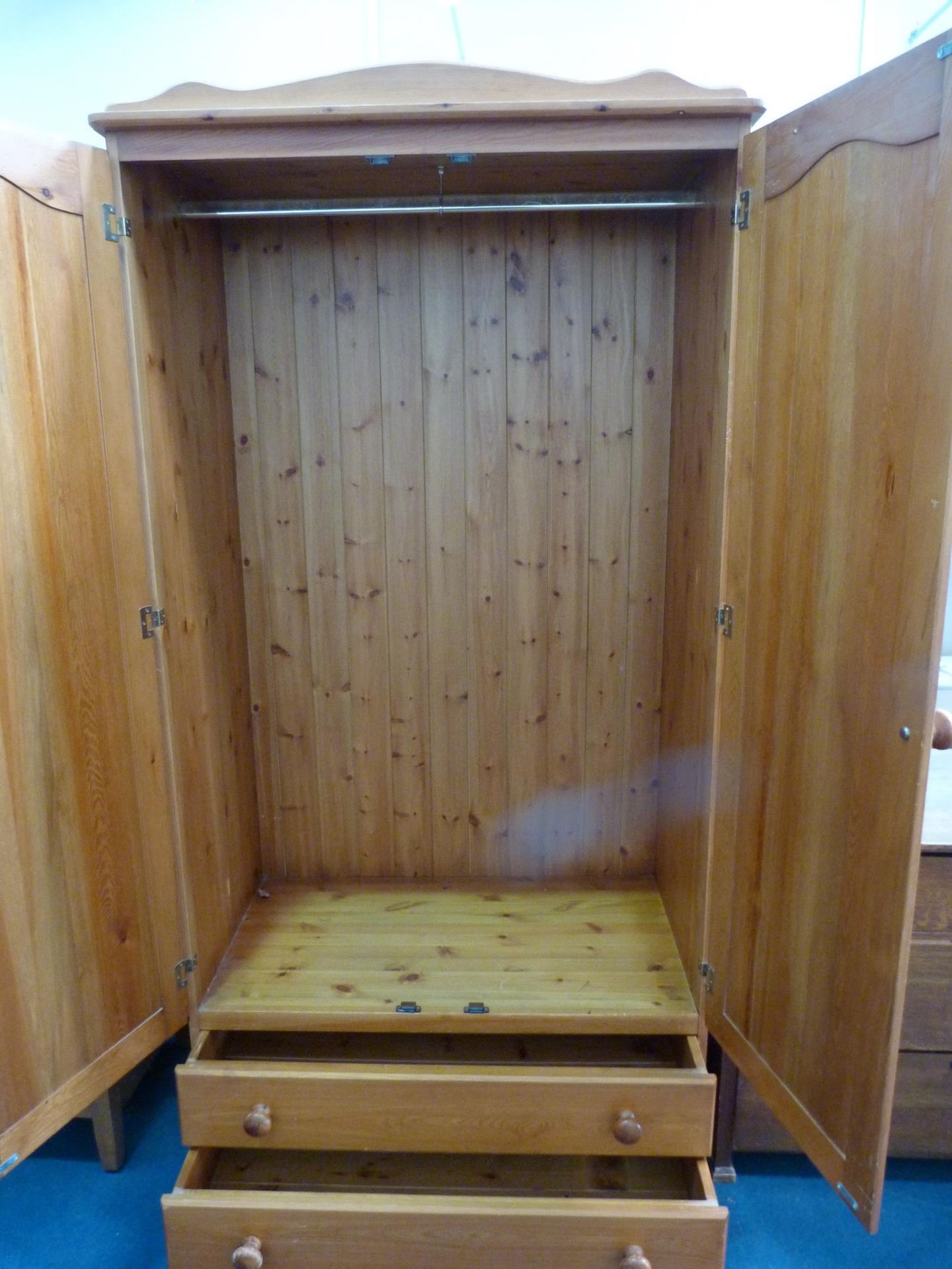 A Modern Pine two door Wardrobe with drawers to the base 96cms wide. (Est. £40- £60) - Image 3 of 3